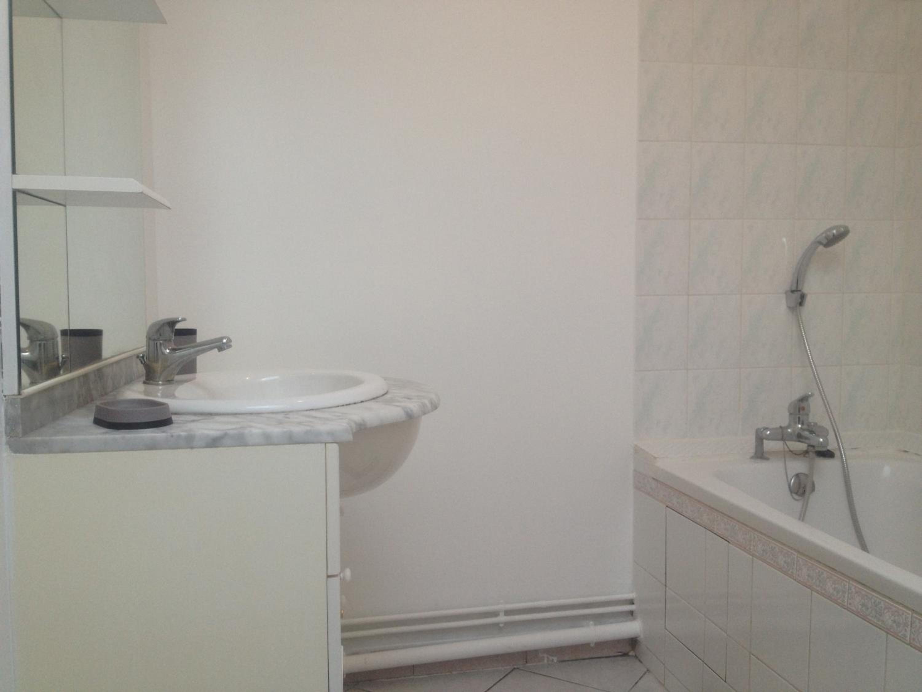 Three-Bedroom House - Photo 12
