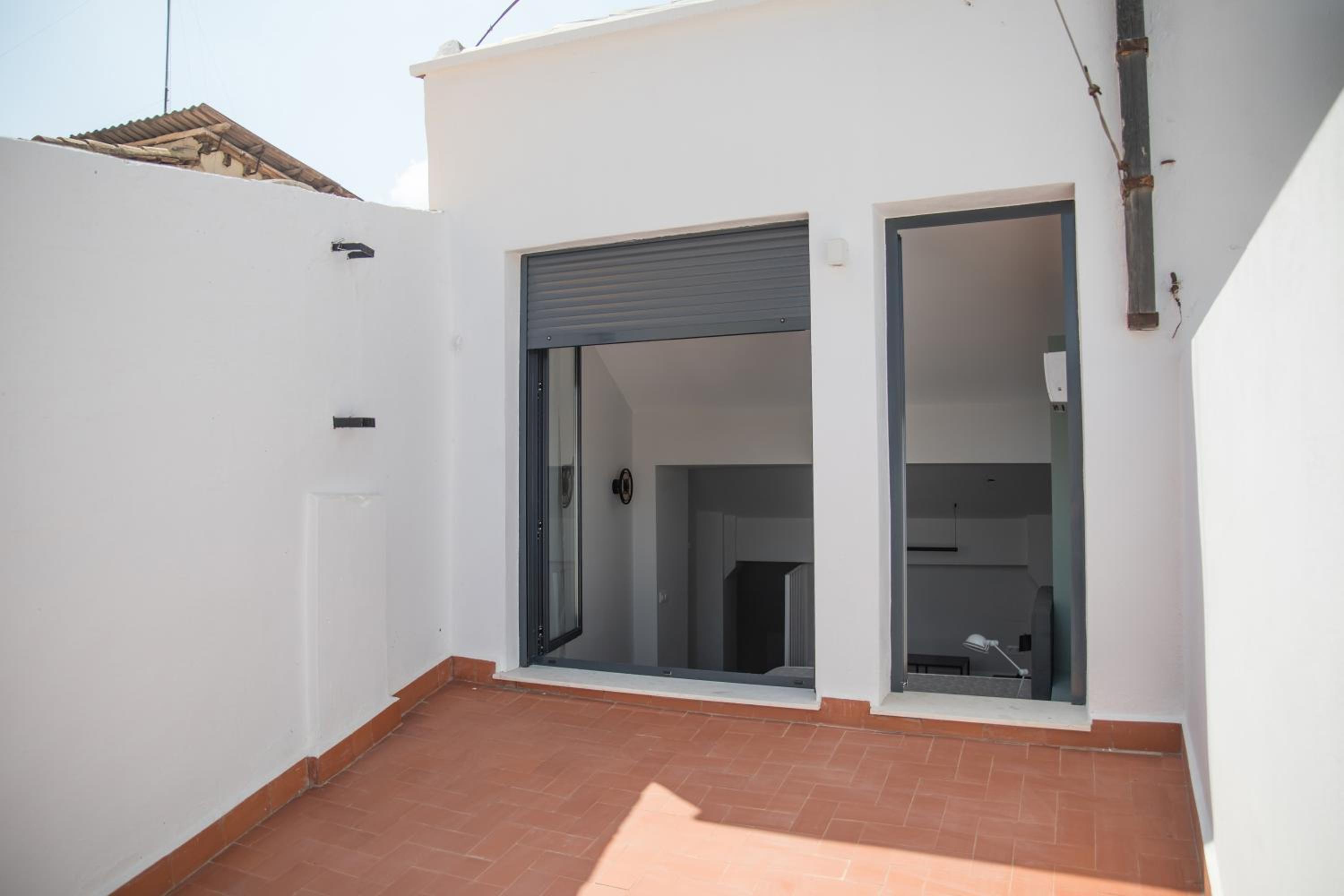 Three-Bedroom Apartment with Terrace - Photo 4