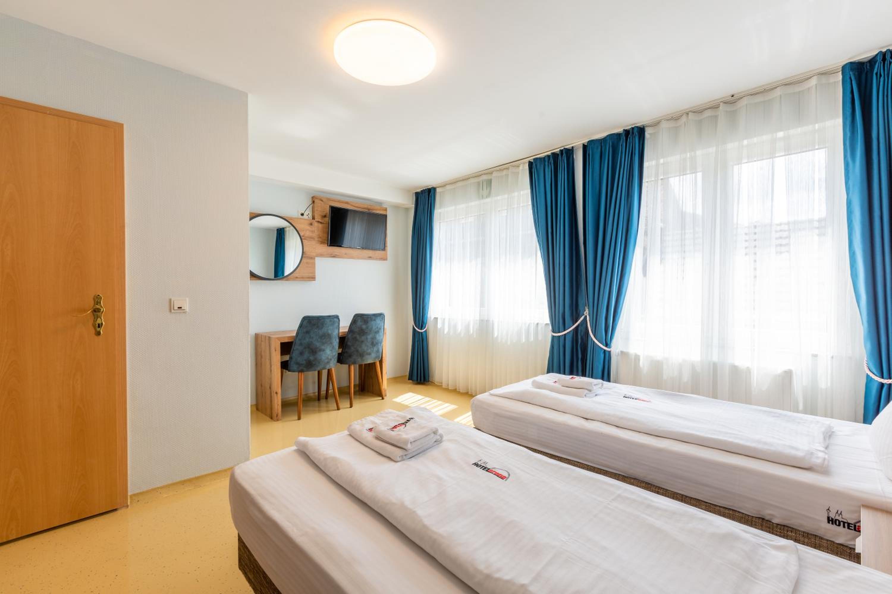 Twin Room - Photo 1