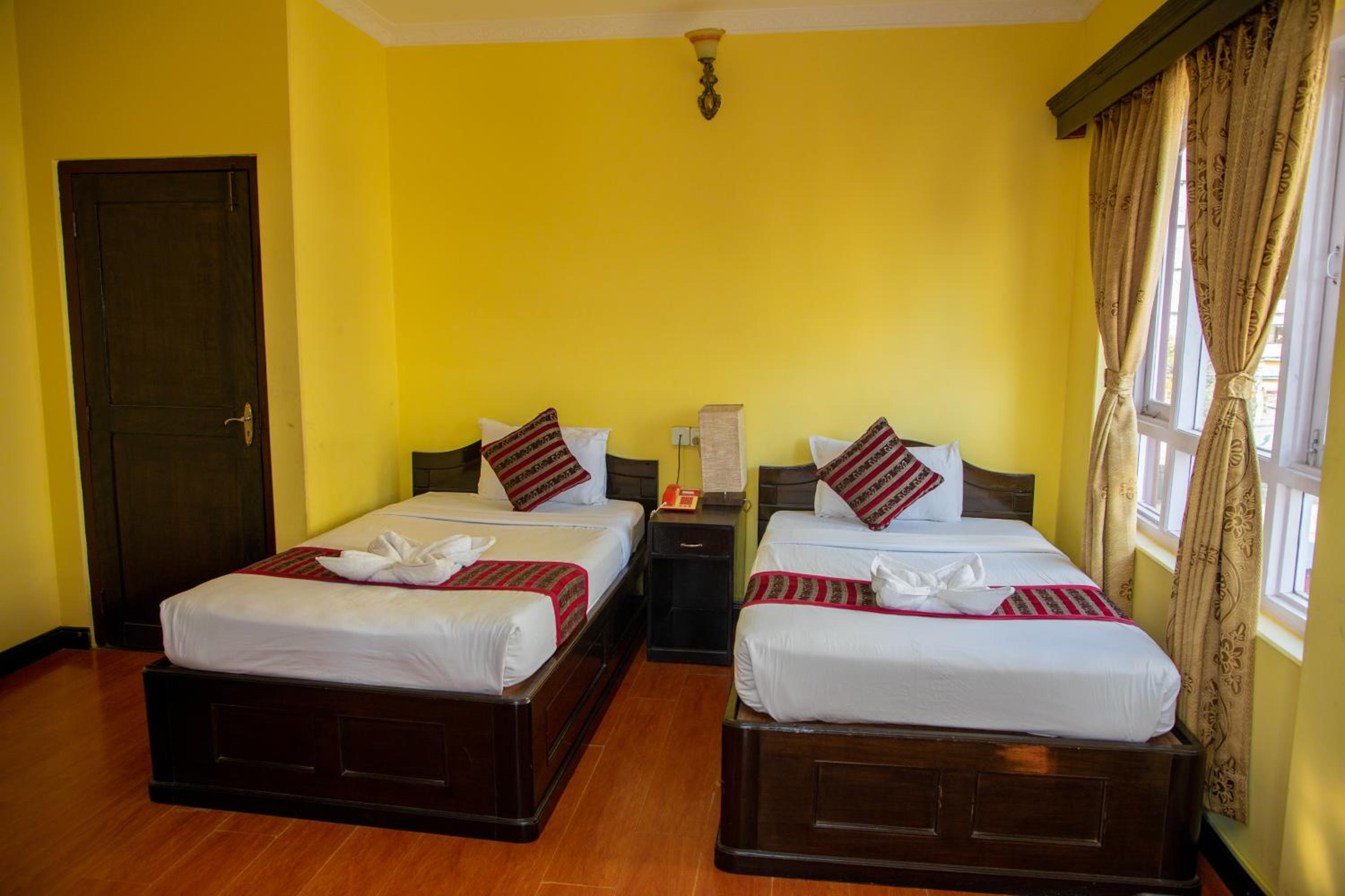 Standard Twin Room - Photo 4