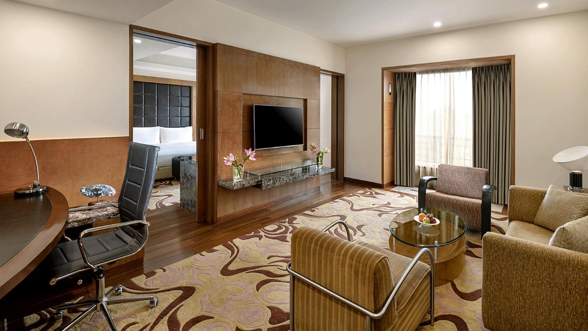 Suite 1 Bed with Happy Hours 01:00 PM to 06:00 PM 1+1 , Airport Transfers,Free Pick up and drop to Worldmark Aerocity (subject to car availability) Suite 1 Bed with Happy Hours 01:00 PM to 06:00 PM 1+1 , Airport Transfers,Free Pick up and drop to Worldmark Aerocity (subject to car availability)