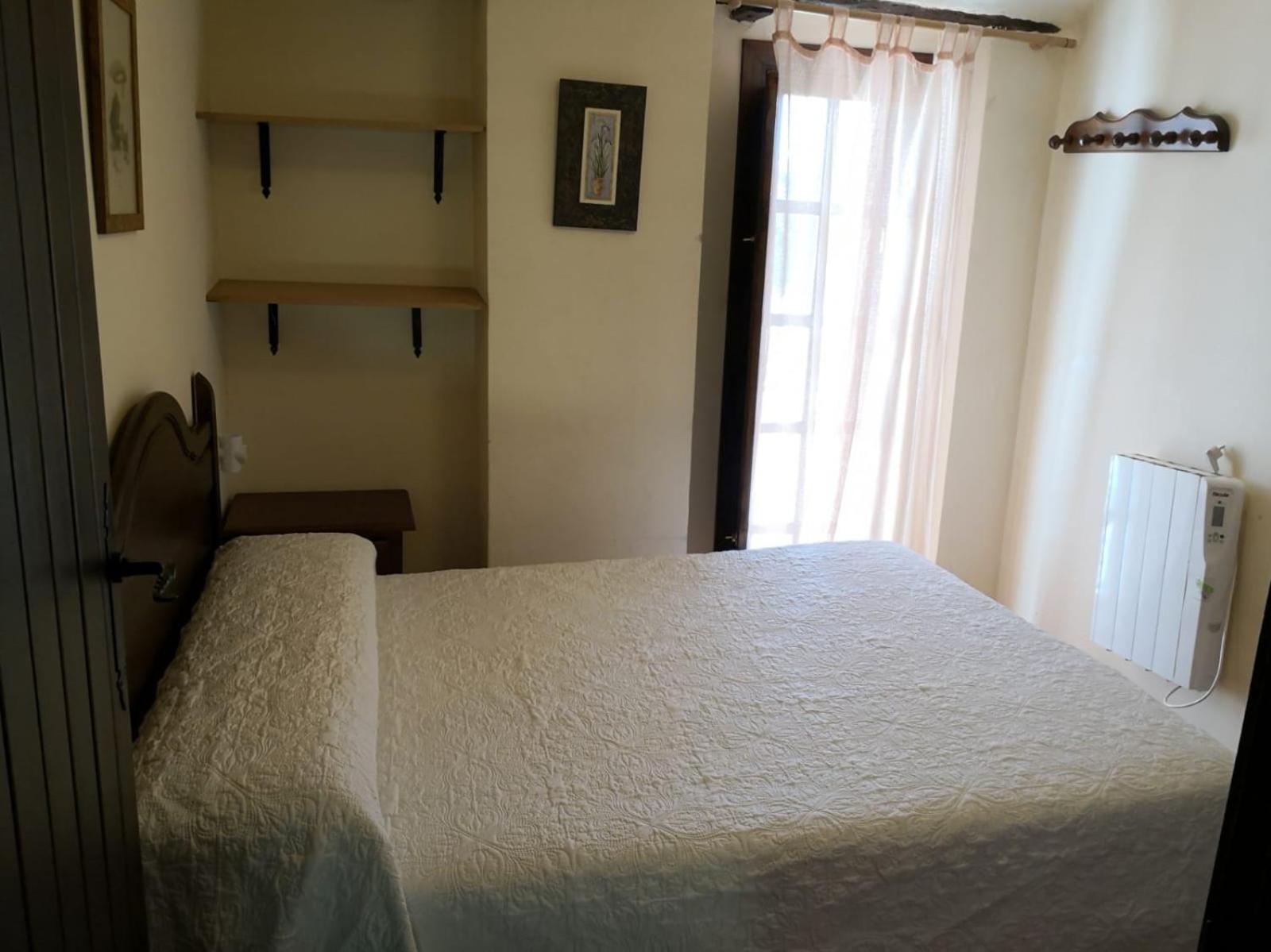 Casa de cuatro habitaciones