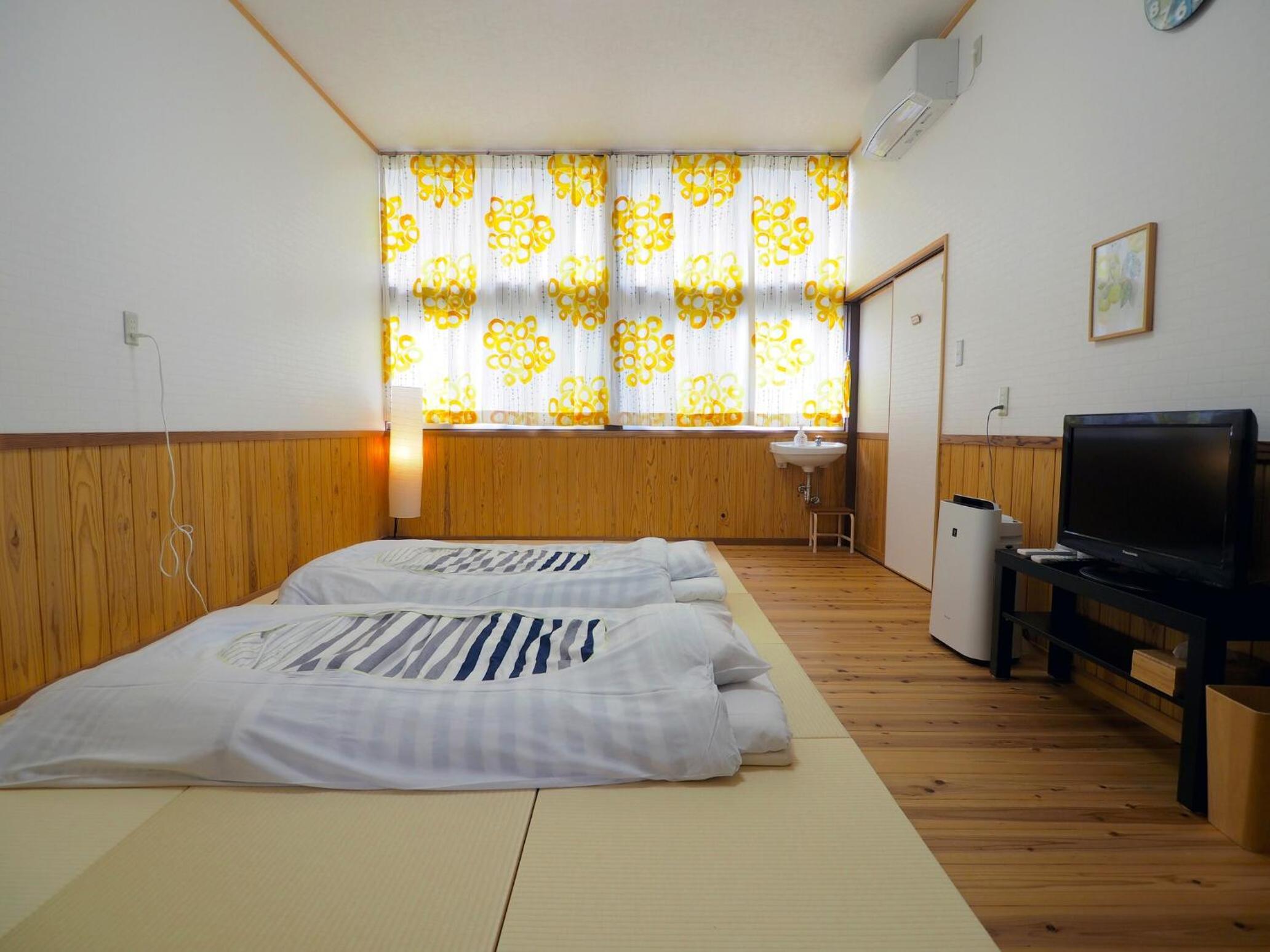 Quadruple Room with Private External Bathroom - Photo 1