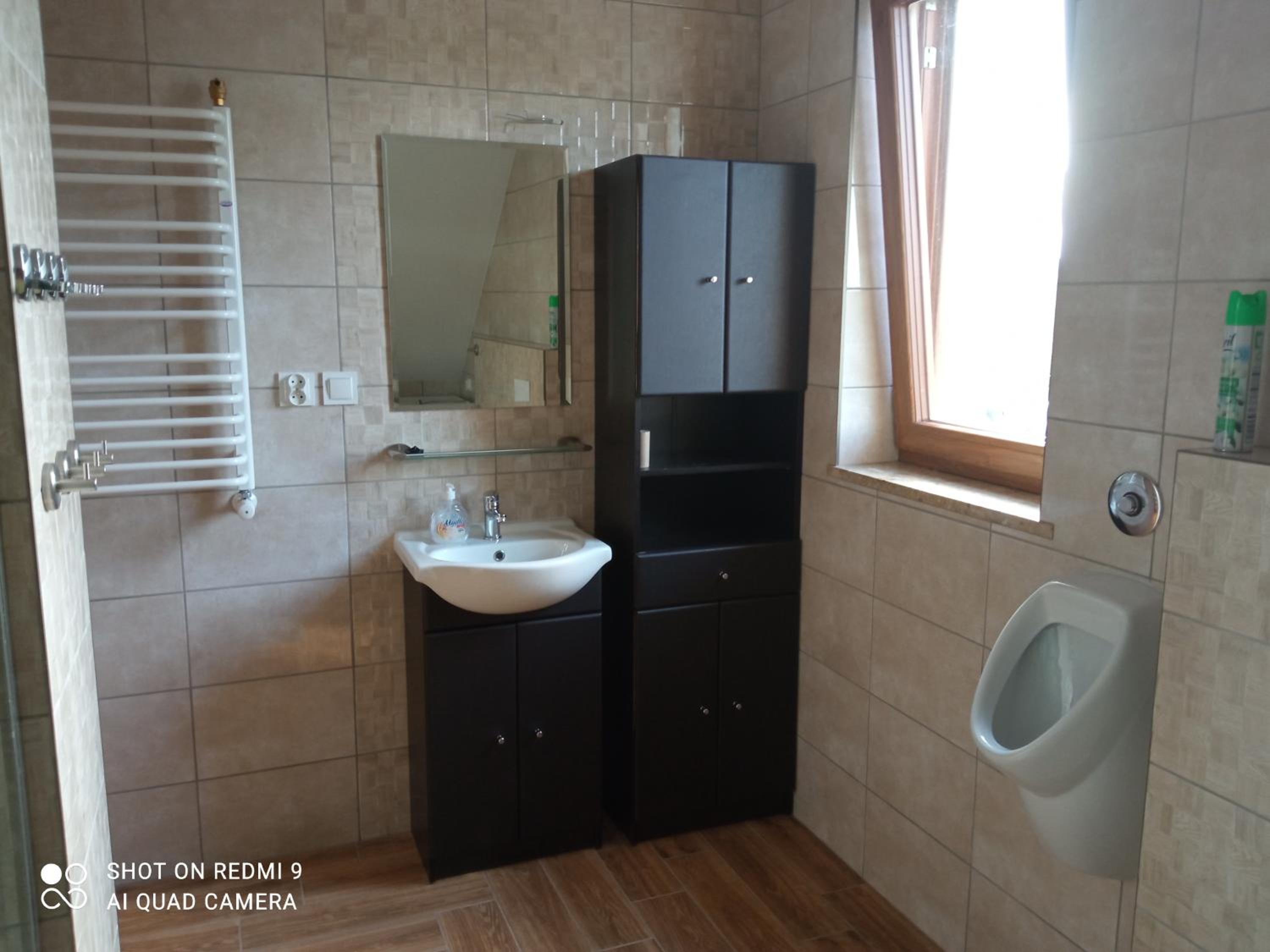 Three-Bedroom Apartment - Photo 17