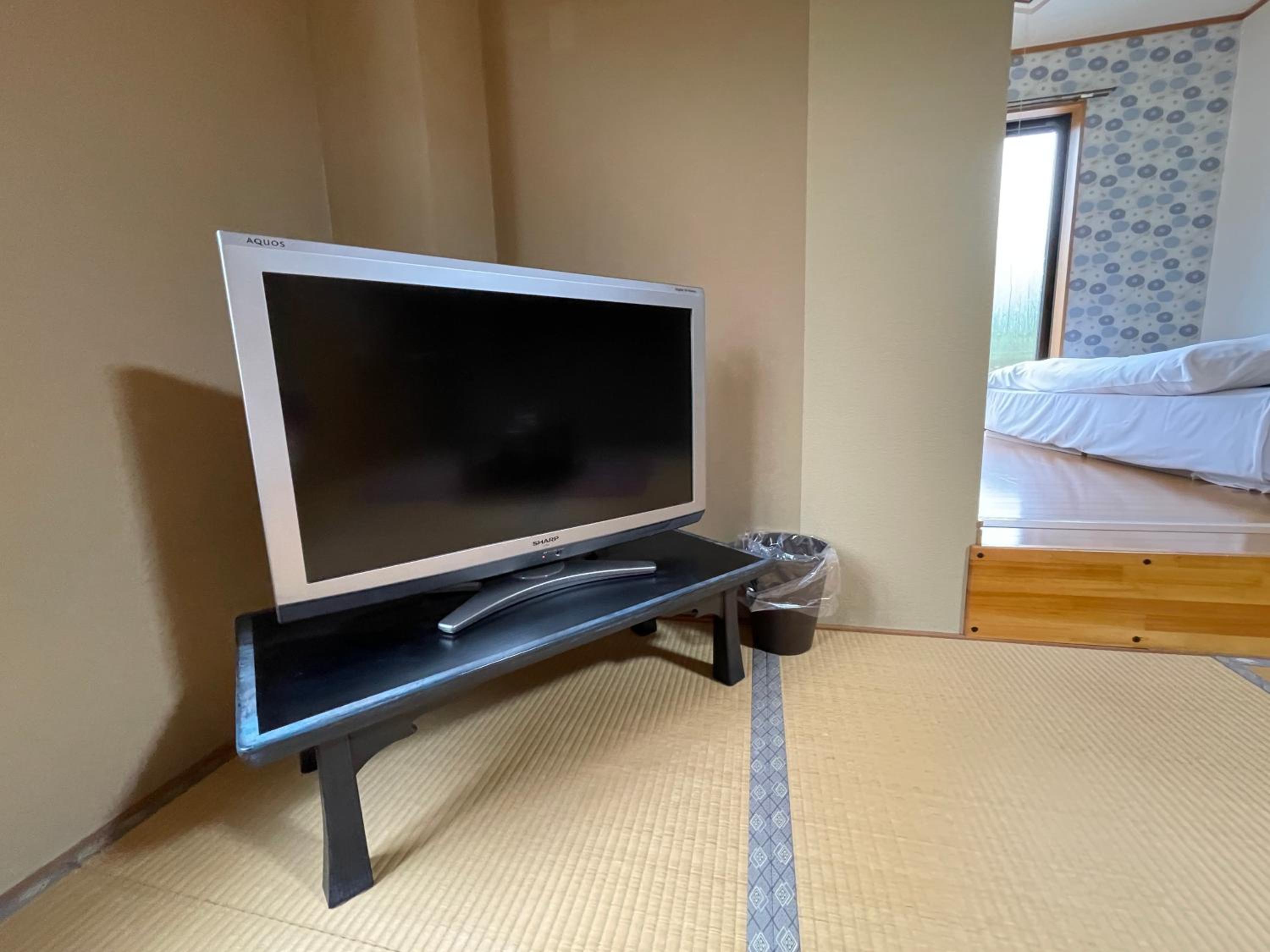 Deluxe Quadruple Room - Photo 7