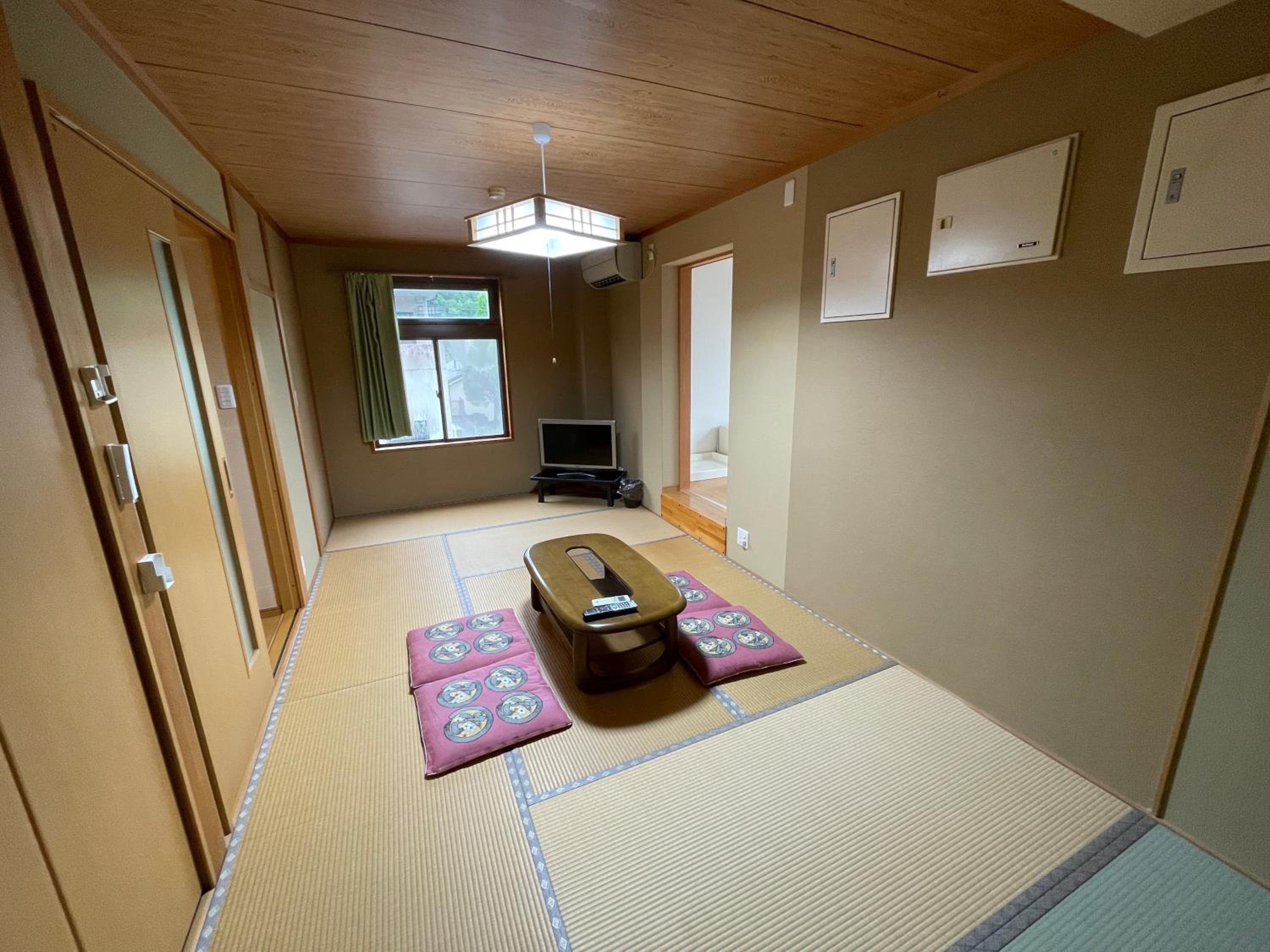 Deluxe Quadruple Room - Photo 1