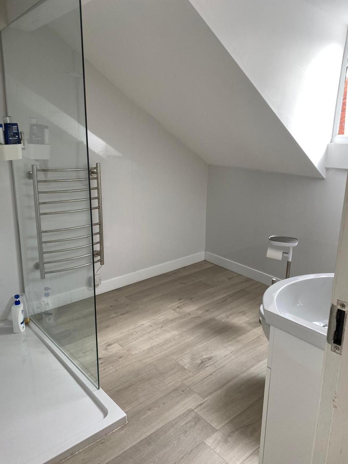 Three-Bedroom Apartment - Photo 17