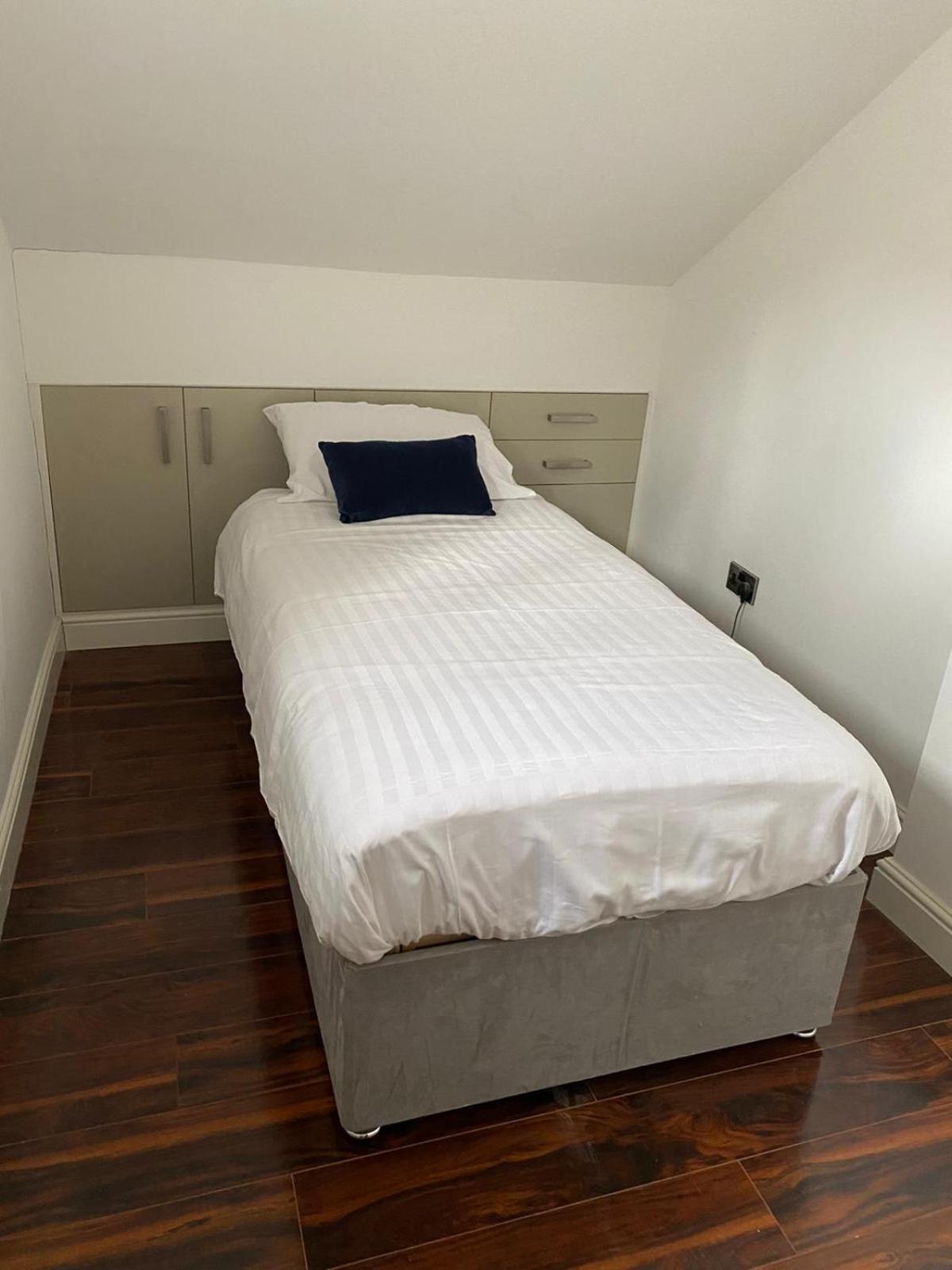 Three-Bedroom Apartment - Photo 11