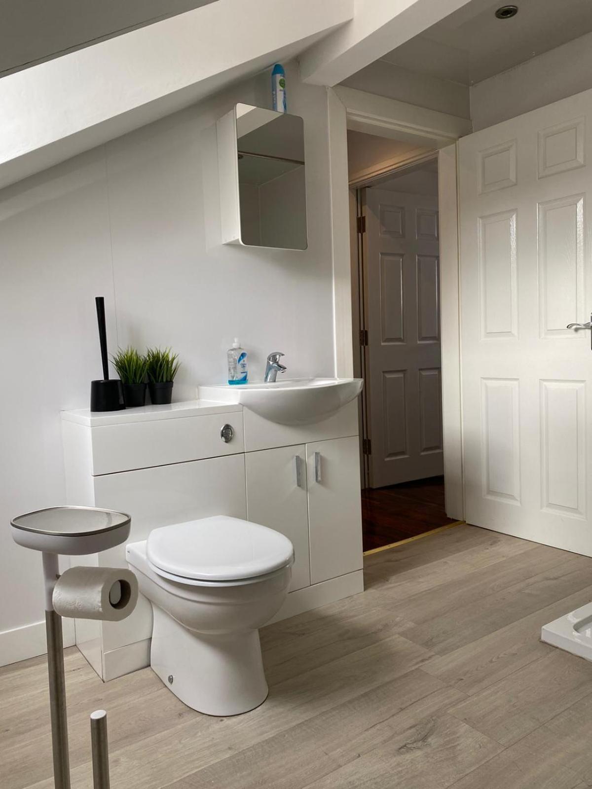 Three-Bedroom Apartment - Photo 16