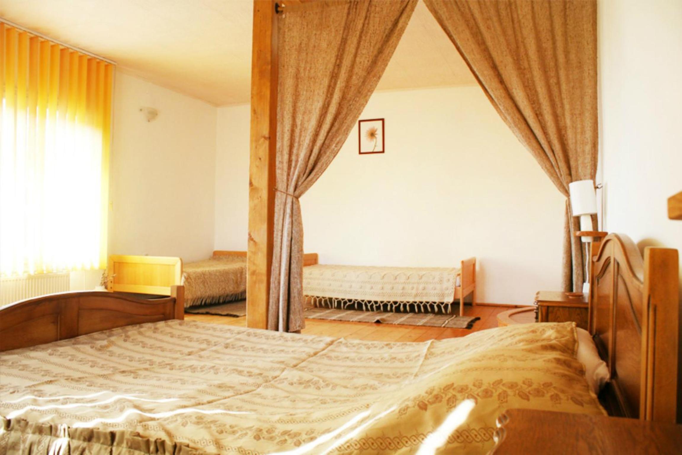 Quadruple Room with Private Bathroom - Photo 1