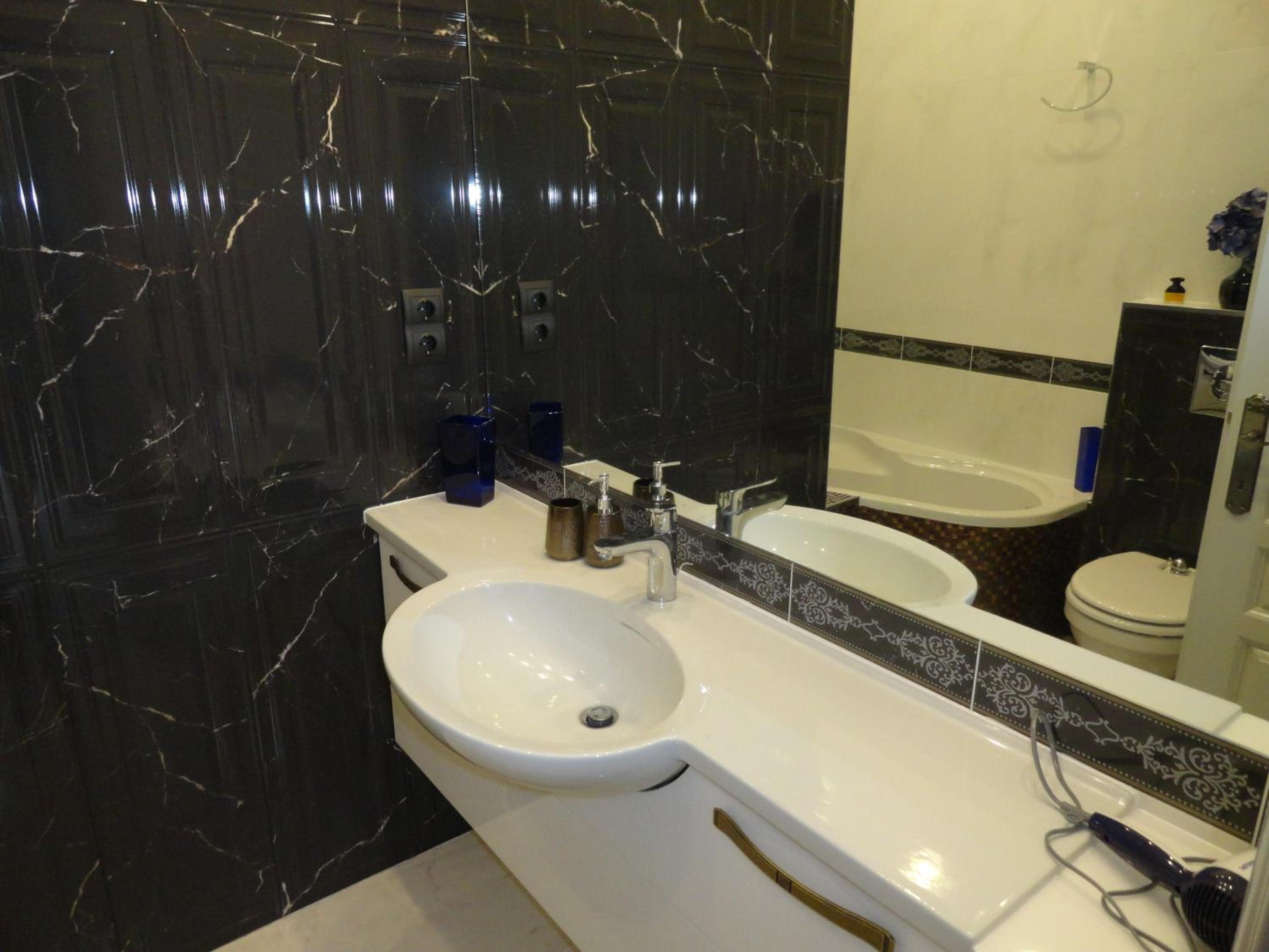 Two-Bedroom Apartment - Photo 26