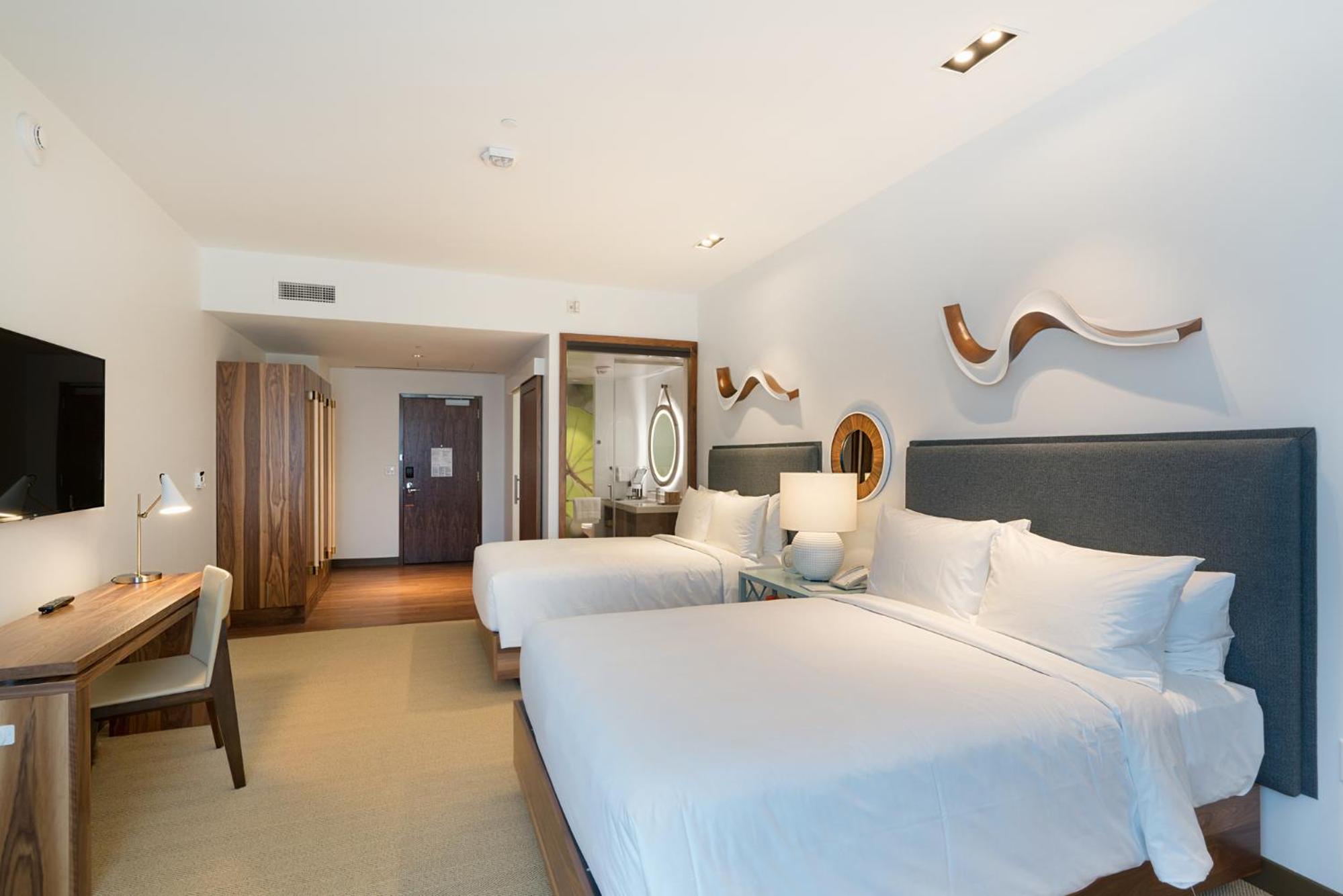 Deluxe Queen Room with Two Queen Beds at Hyatt Centric Waikiki Beach in Honolulu