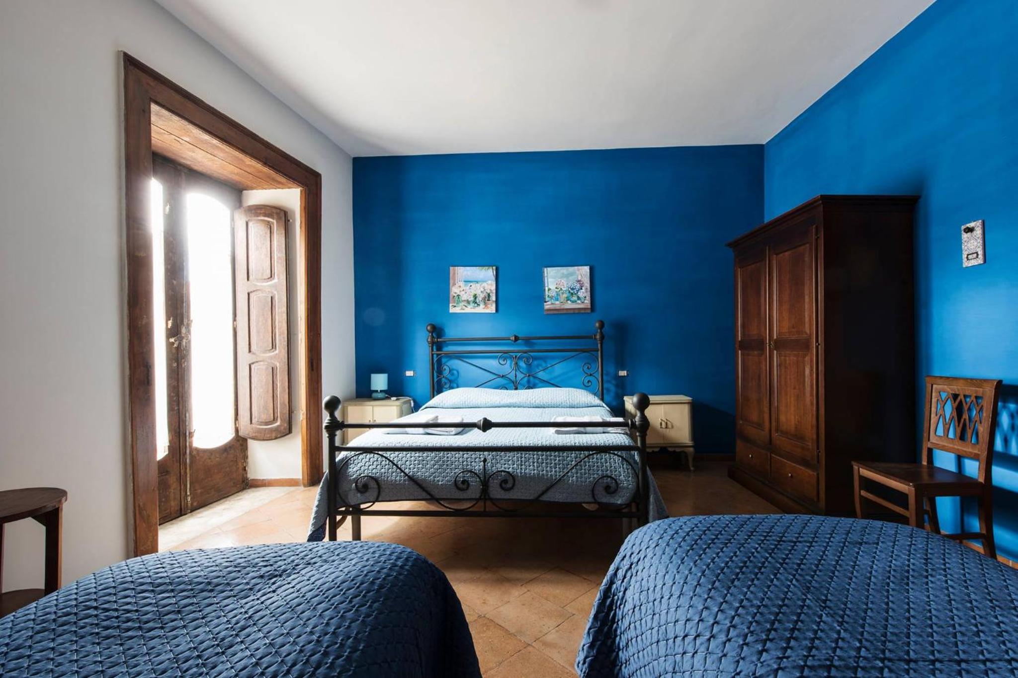 Quadruple Room with Private Bathroom - Photo 1