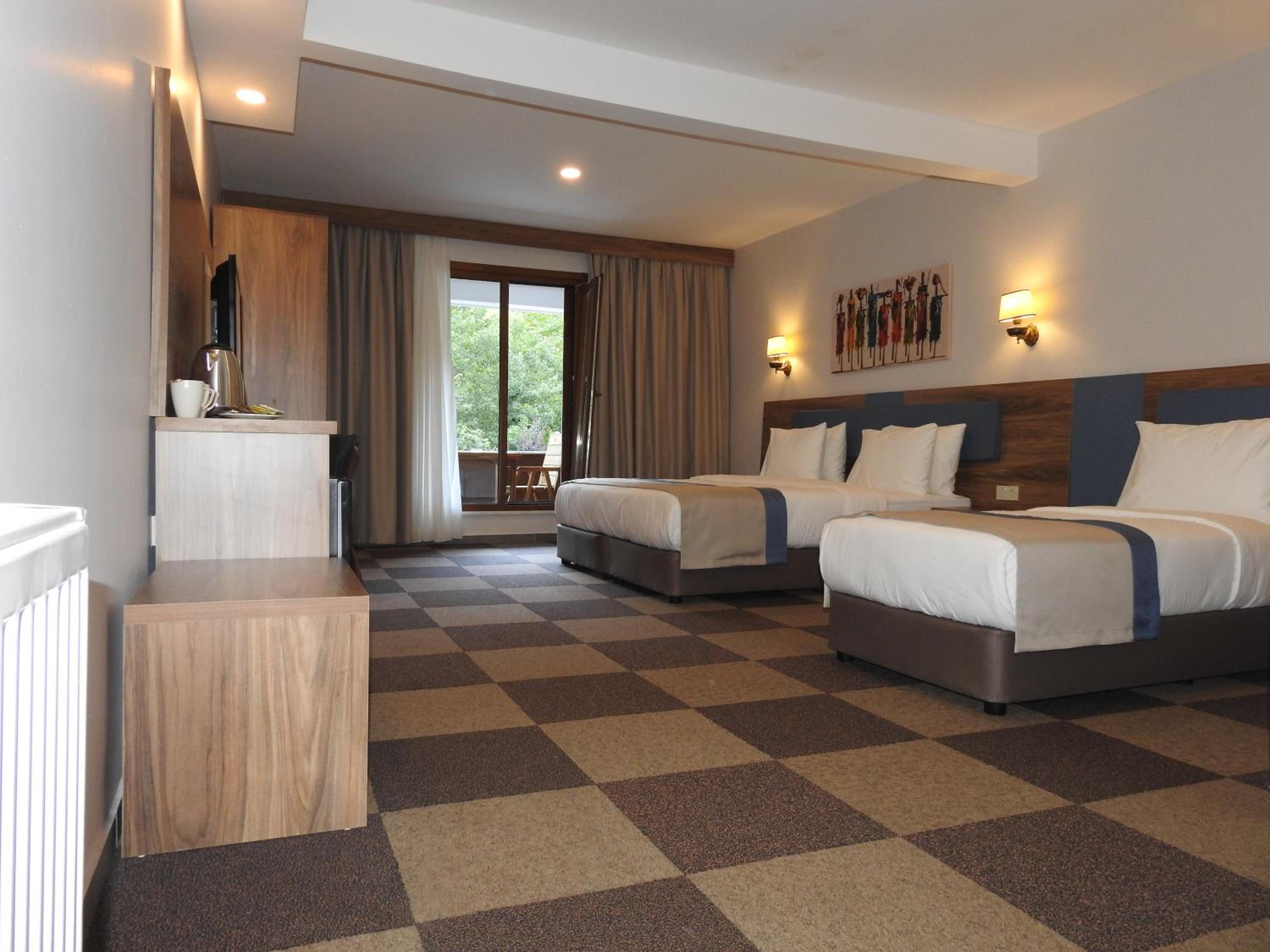 Deluxe Quadruple Room