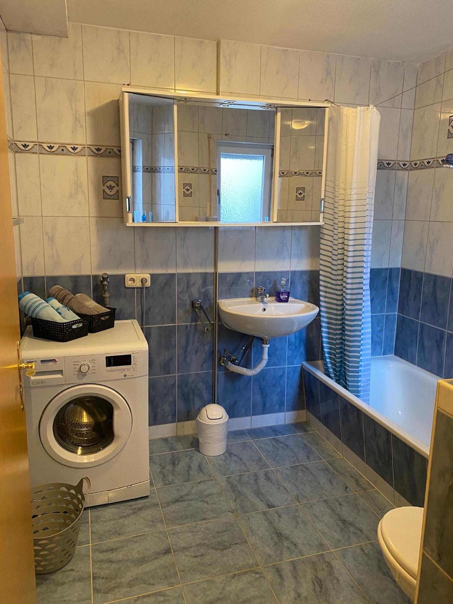Three-Bedroom Apartment - Photo 16