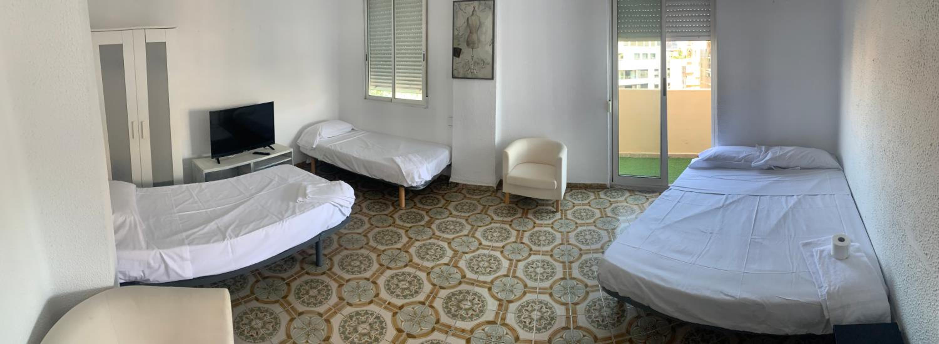 Habitación Cuádruple con Vista al Jardín