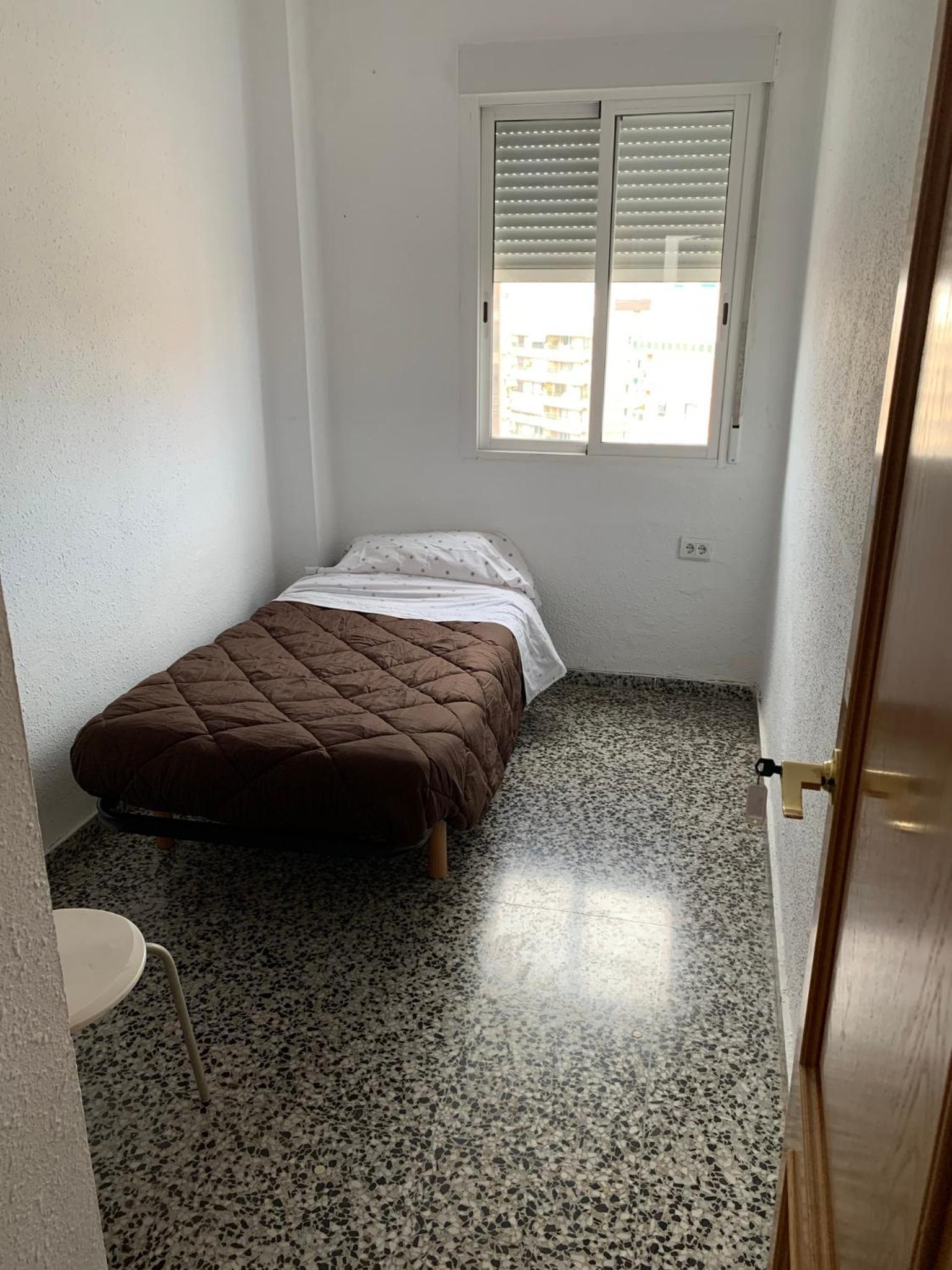 Habitación Individual Estándar con Baño Compartido