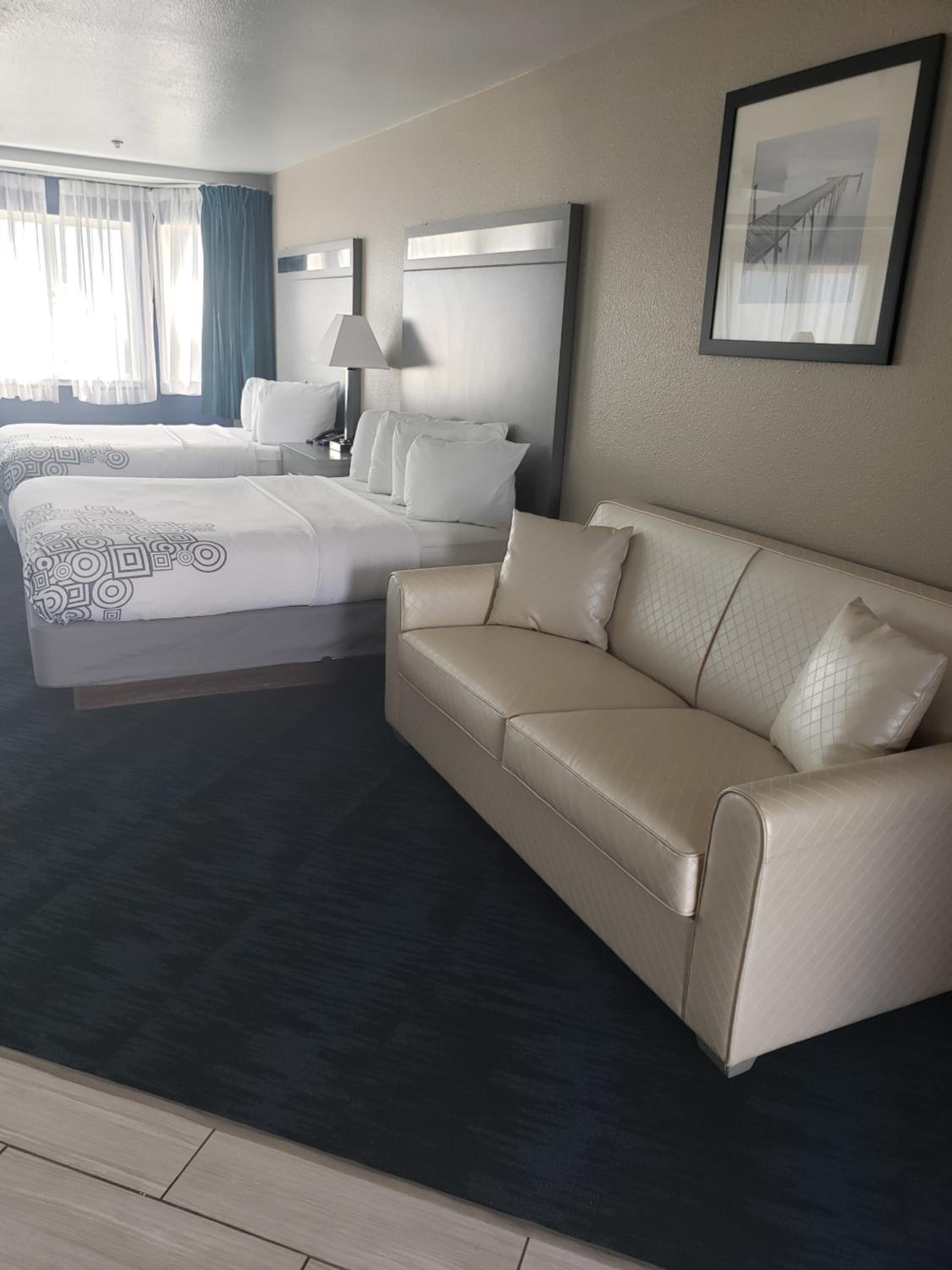 Deluxe Queen Suite with Two Queen Beds & Sofa Bed photo 2