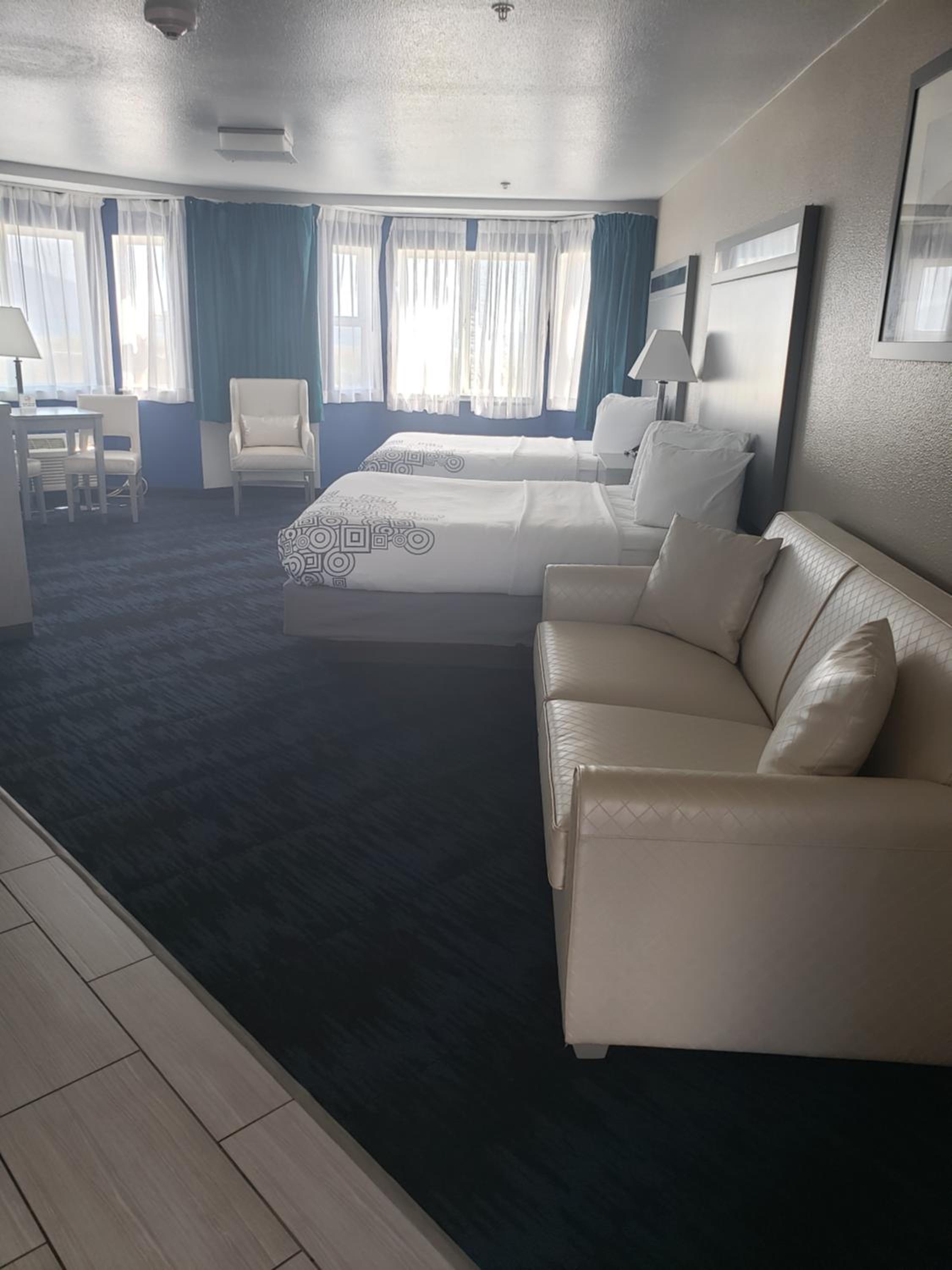Queen Suite with Two Queen Beds & Sofa Bed photo 1