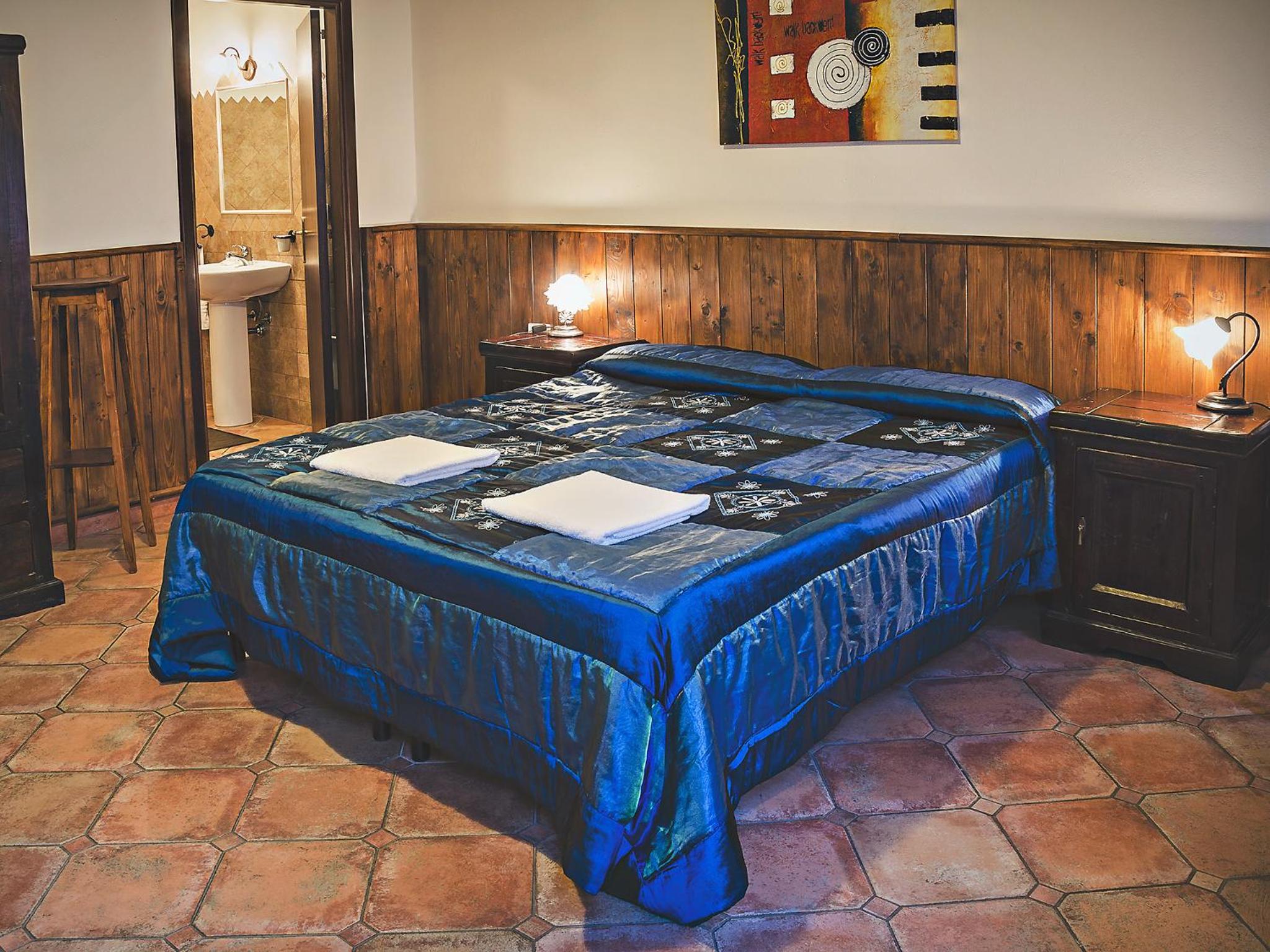 Quadruple Room with Private Bathroom