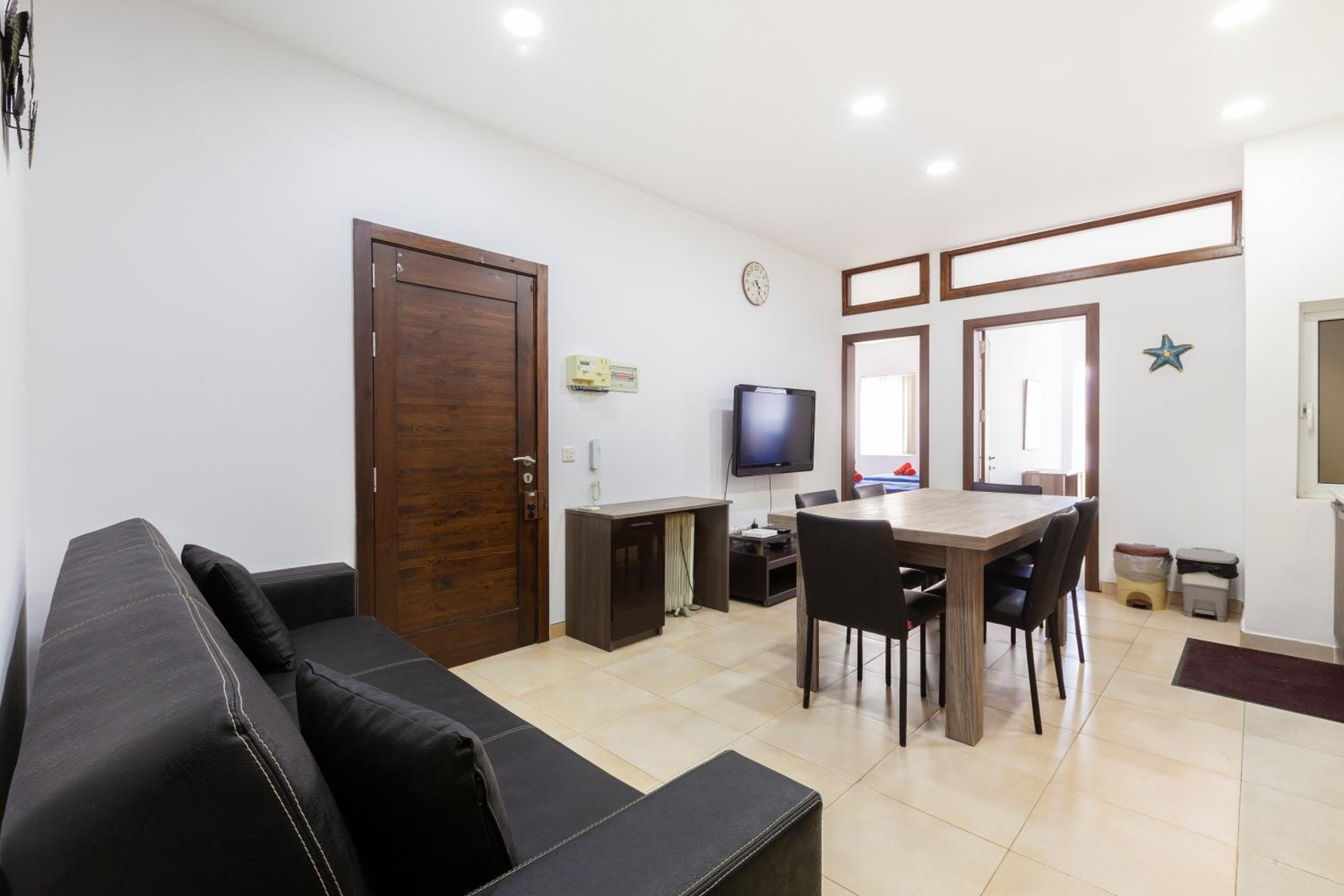 Three-Bedroom Apartment photo 1