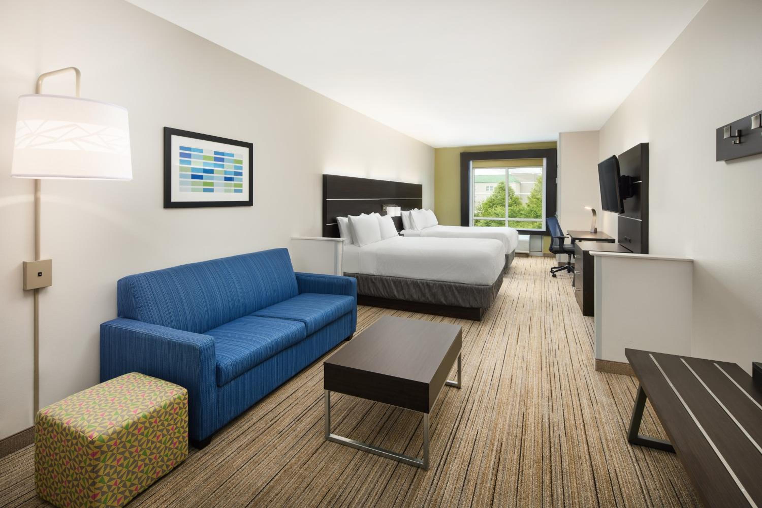 Queen Suite with Two Queen Beds and Sofa Bed - Photo 1