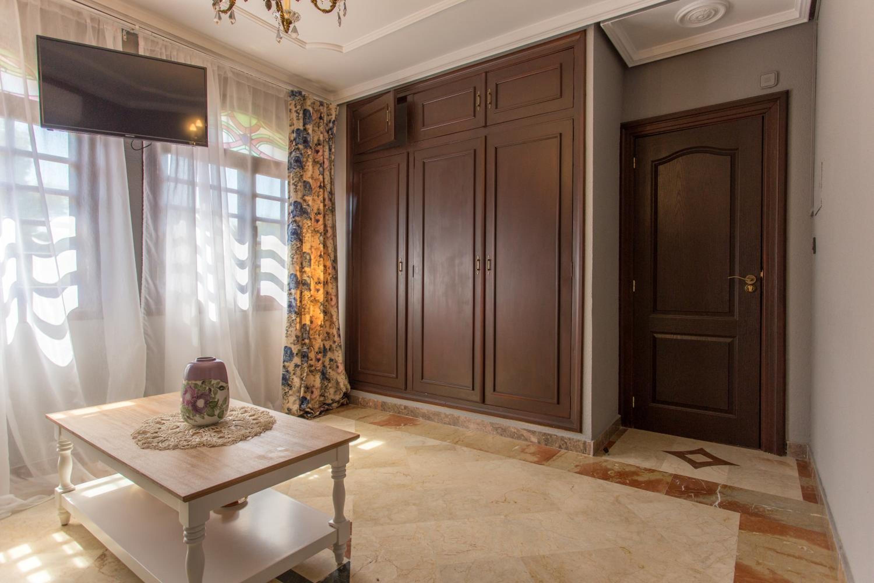 Family Room with Balcony - Photo 10