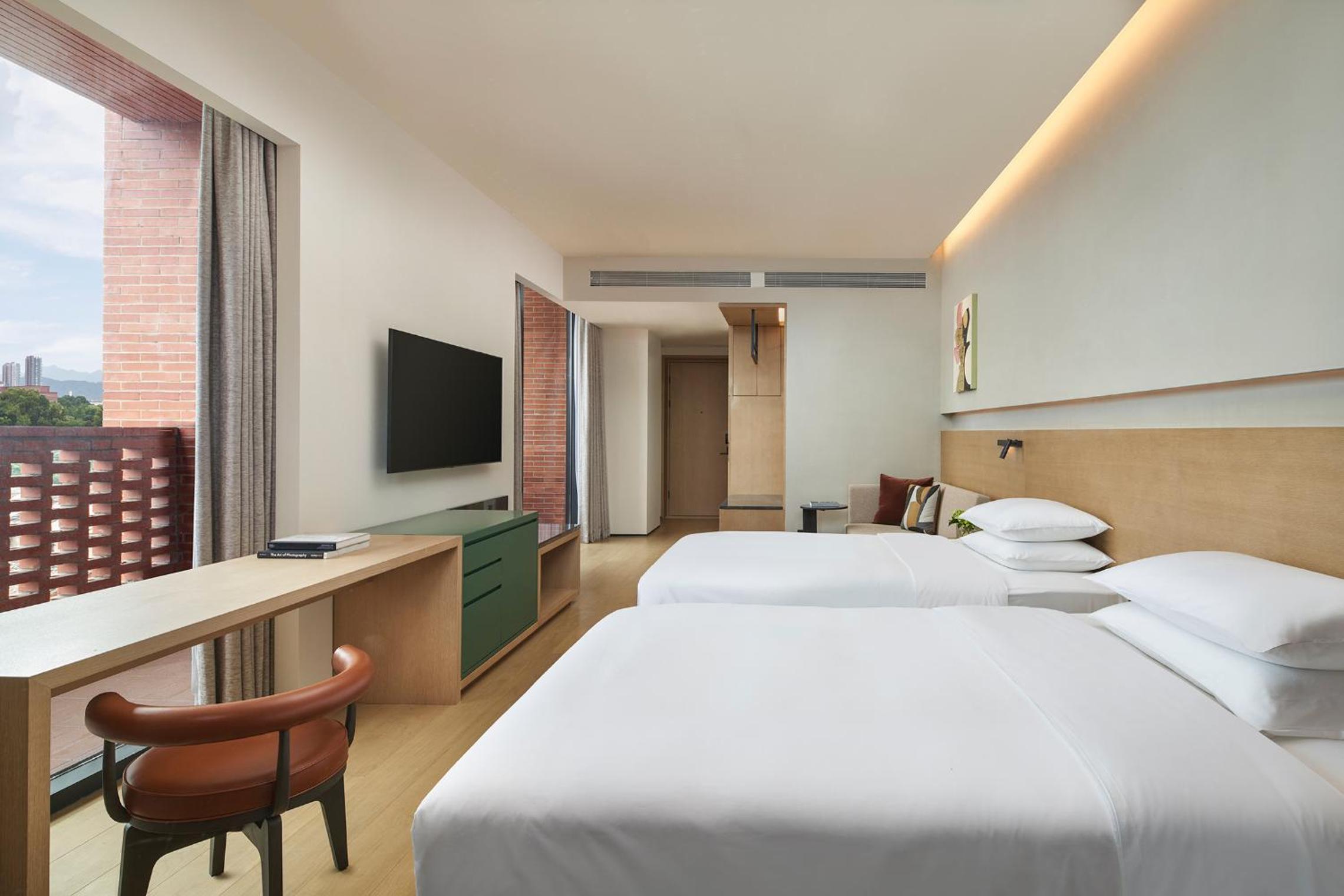Corner Twin Room with Sofa Bed 