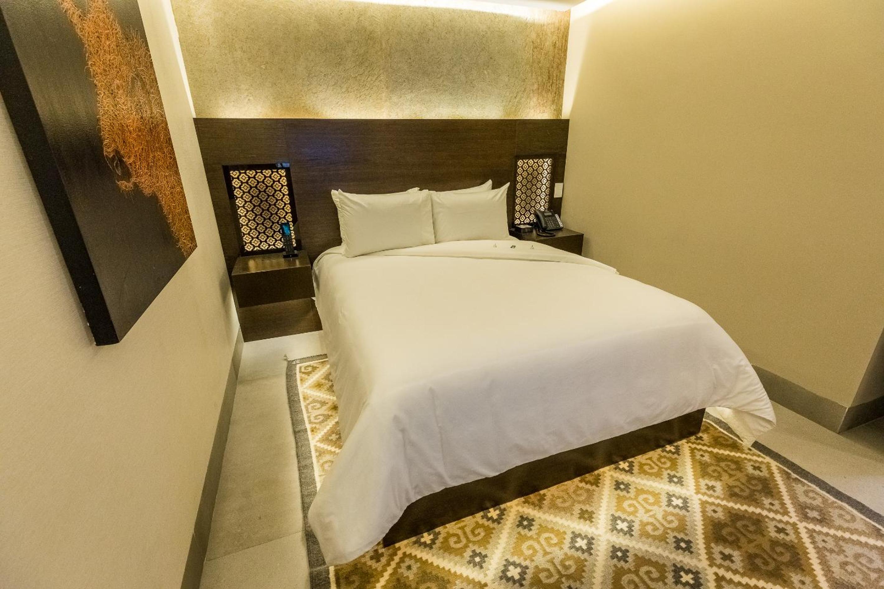 Deluxe Room - Photo 5