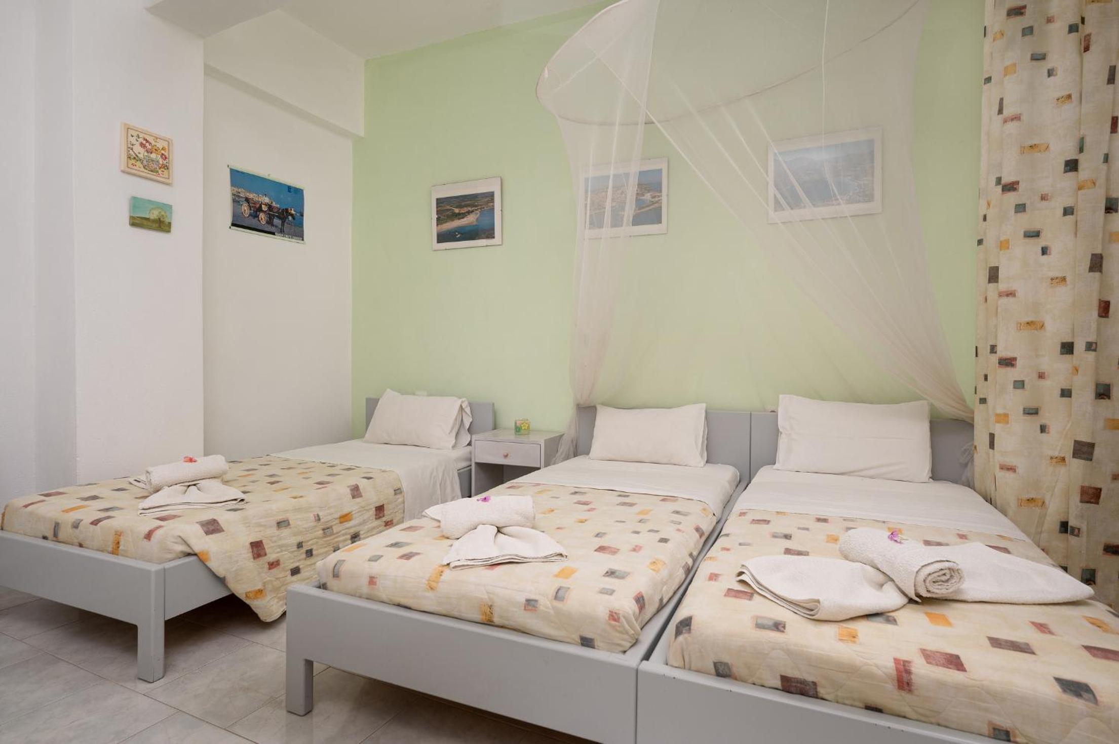 Quadruple Room - Photo 1