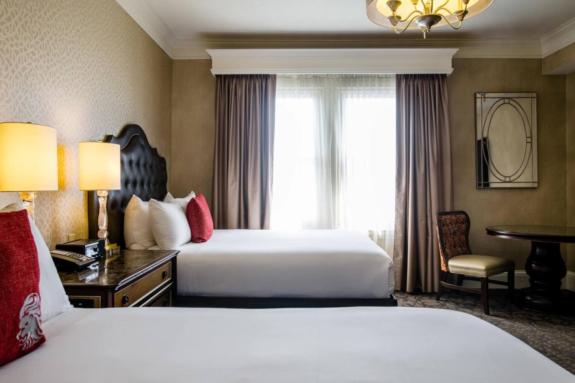 Superior Queen Room with Two Queen Beds - Photo 1