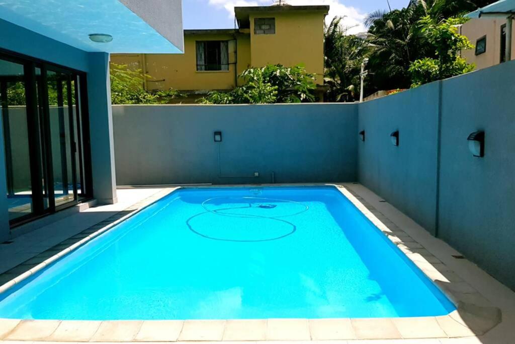 Three-Bedroom House photo 1