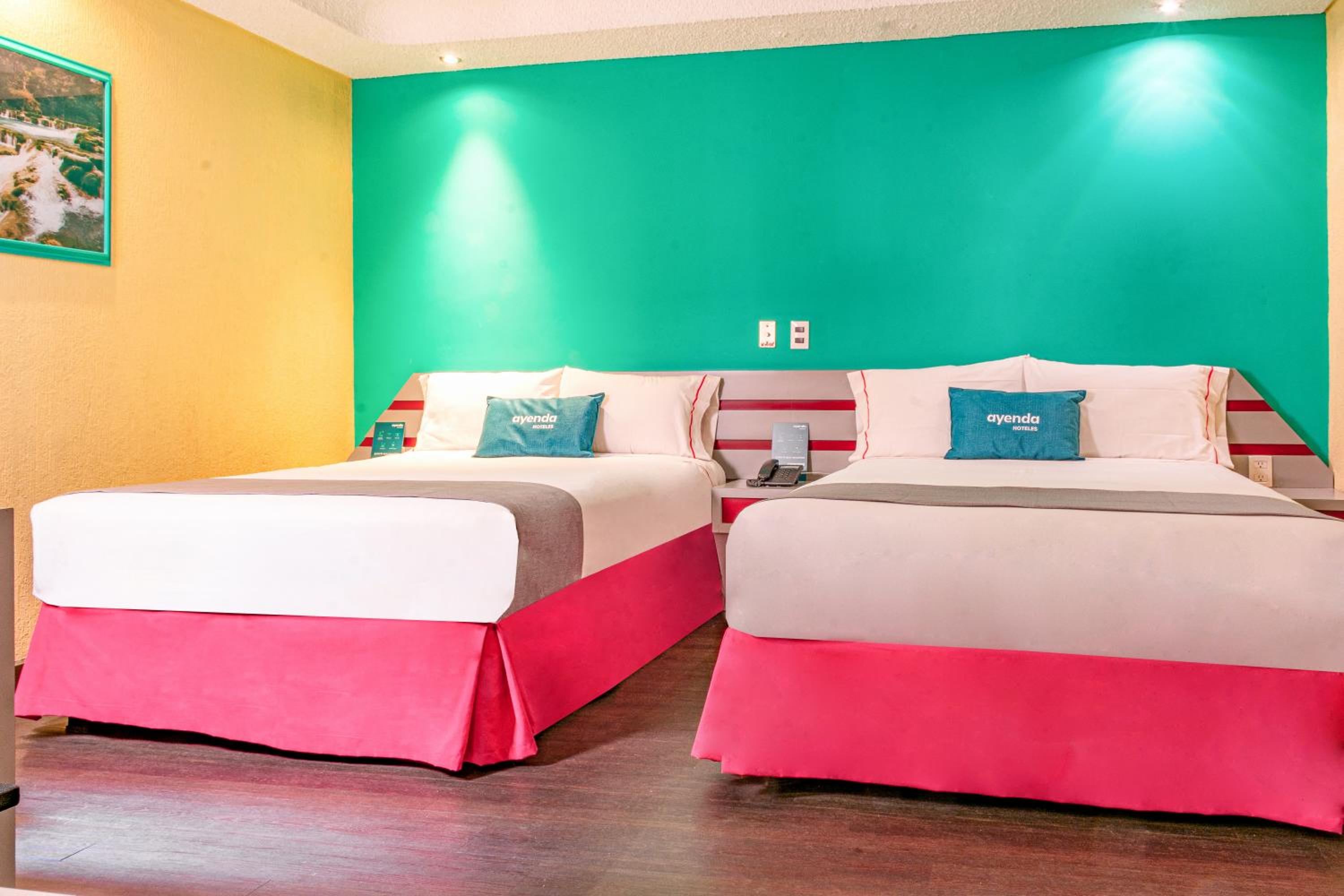 Standard Queen Room with Two Queen Beds photo 3