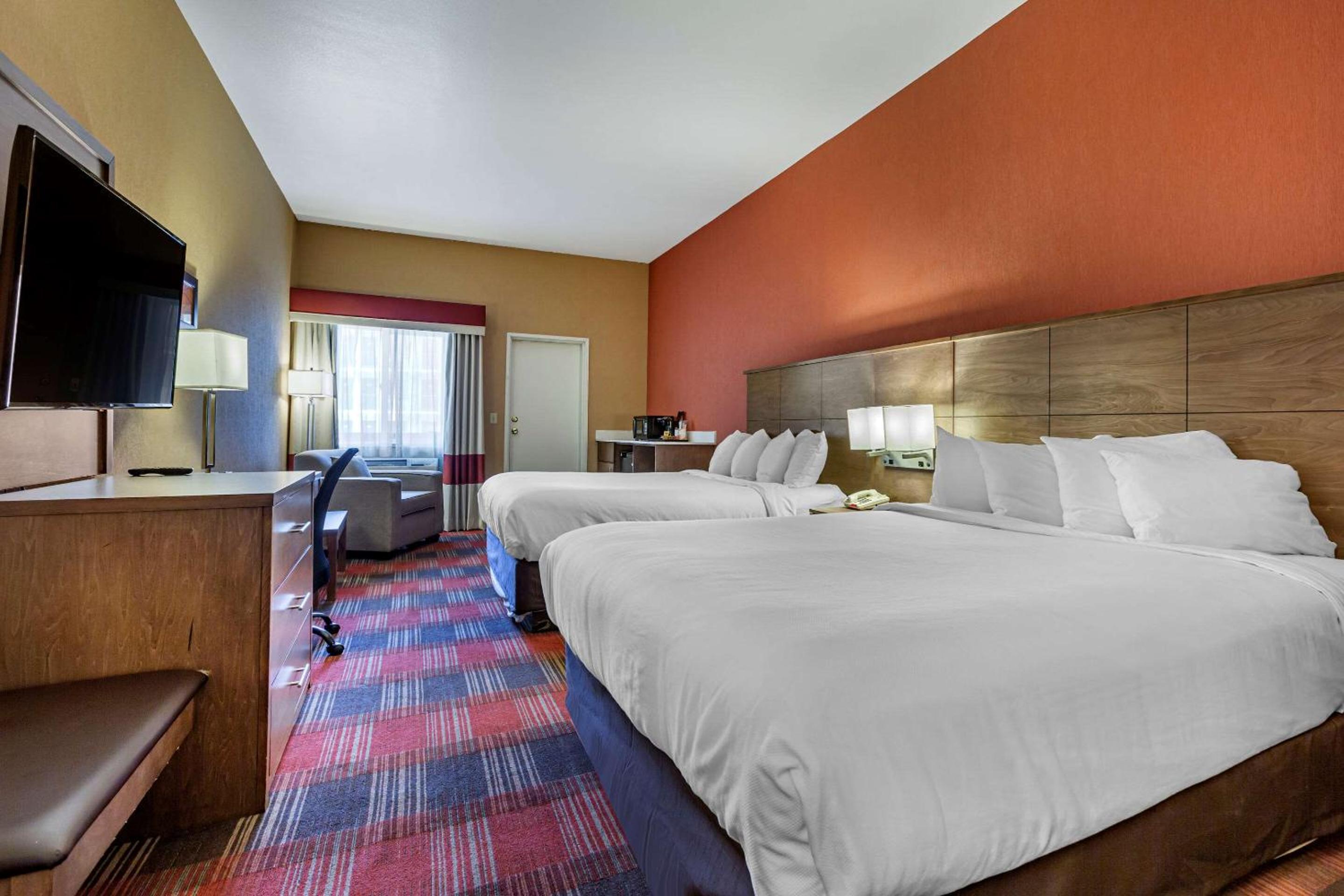 Queen Room with Two Queen Beds and Refrigerator - Non-Smoking - Photo 1