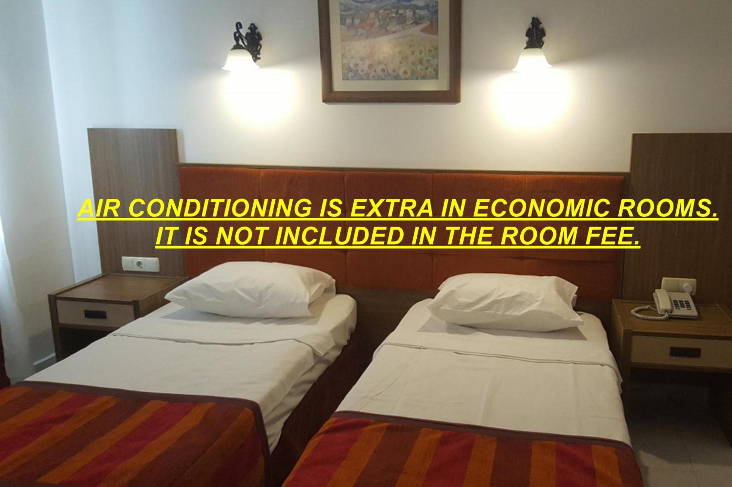 Economy Quadruple Room - Photo 3
