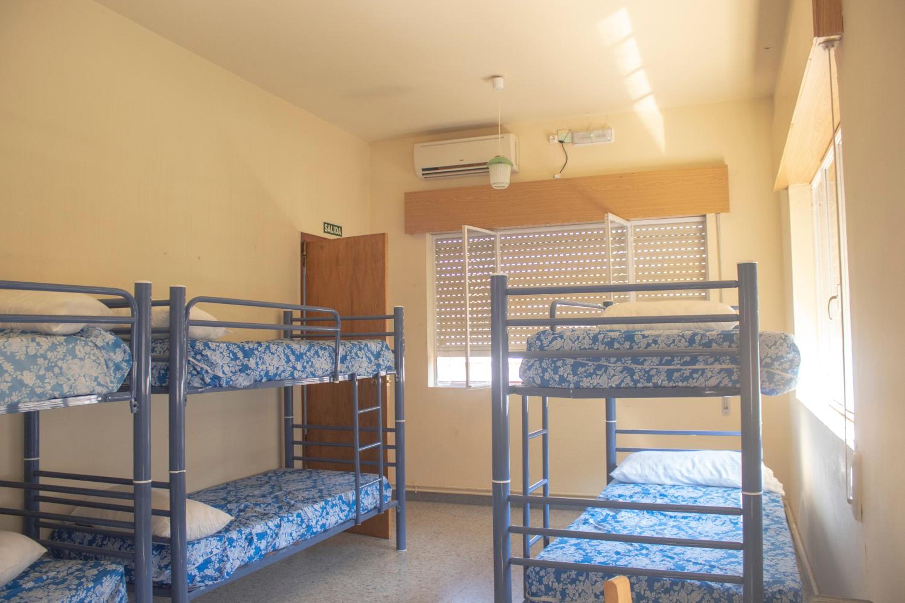 Cama en habitación compartida para 8 personas