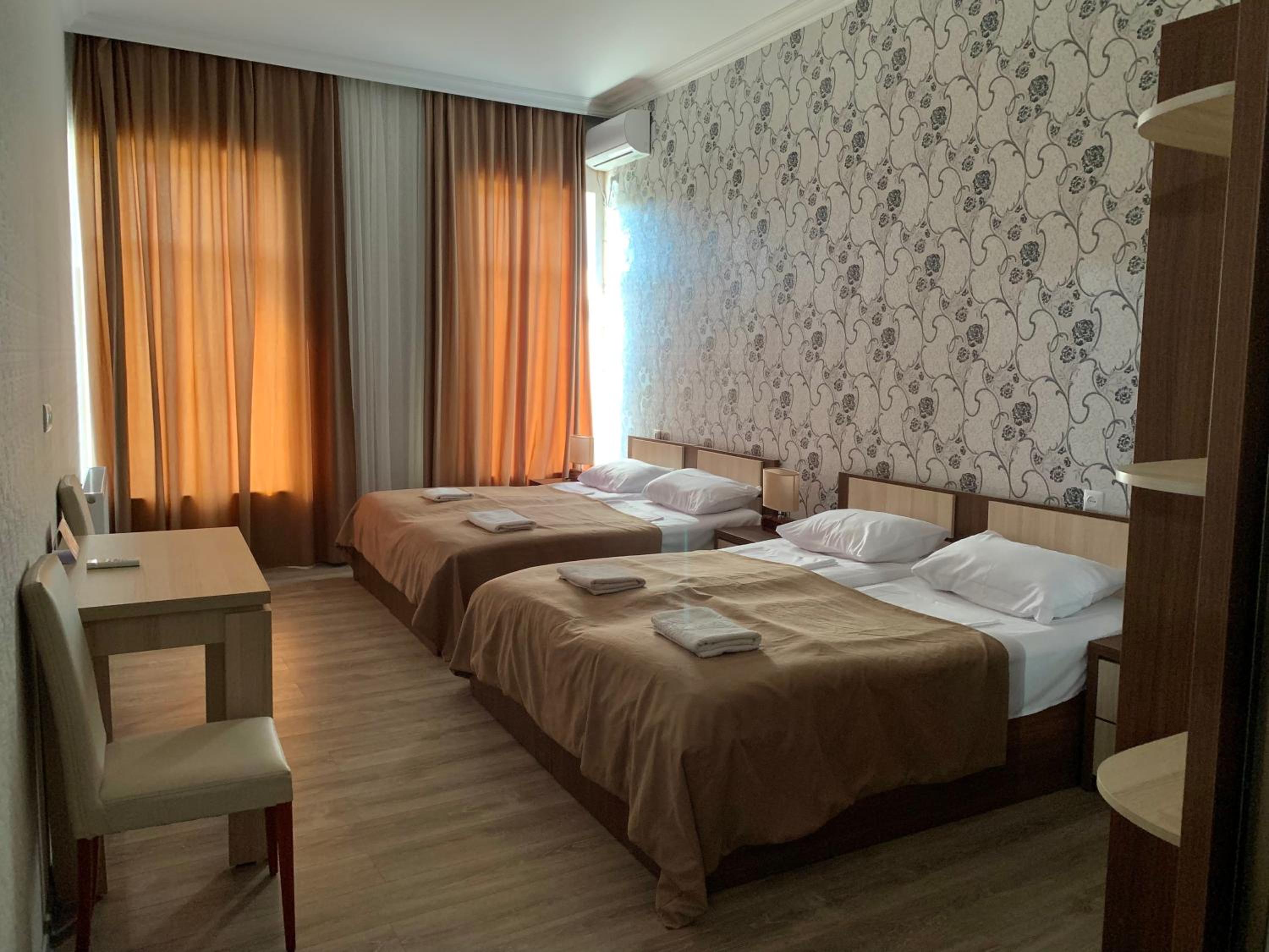 Economy Quadruple Room with Shared Bathroom