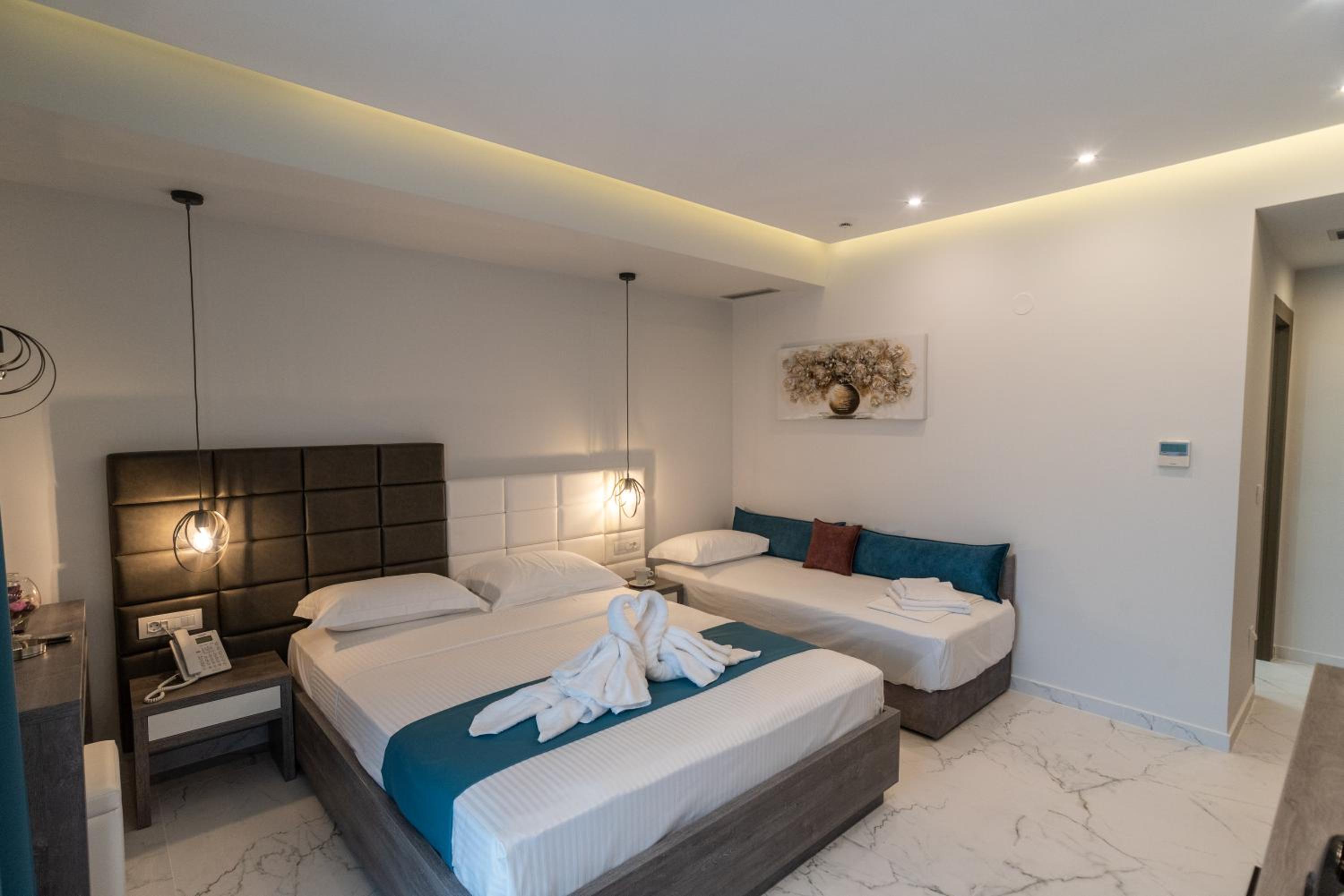 Deluxe Triple Room - Photo 2