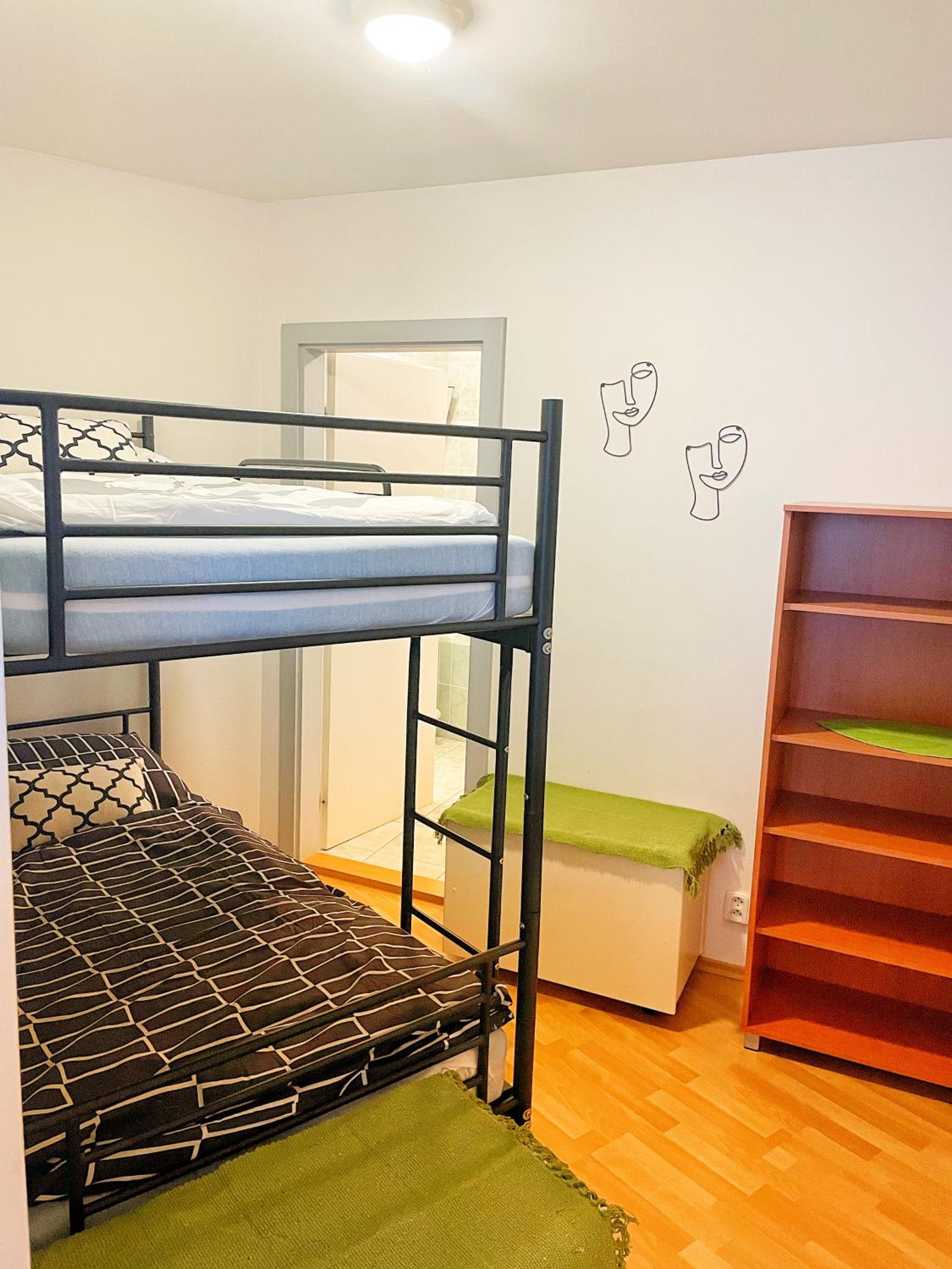 Three-Bedroom Apartment - Photo 19