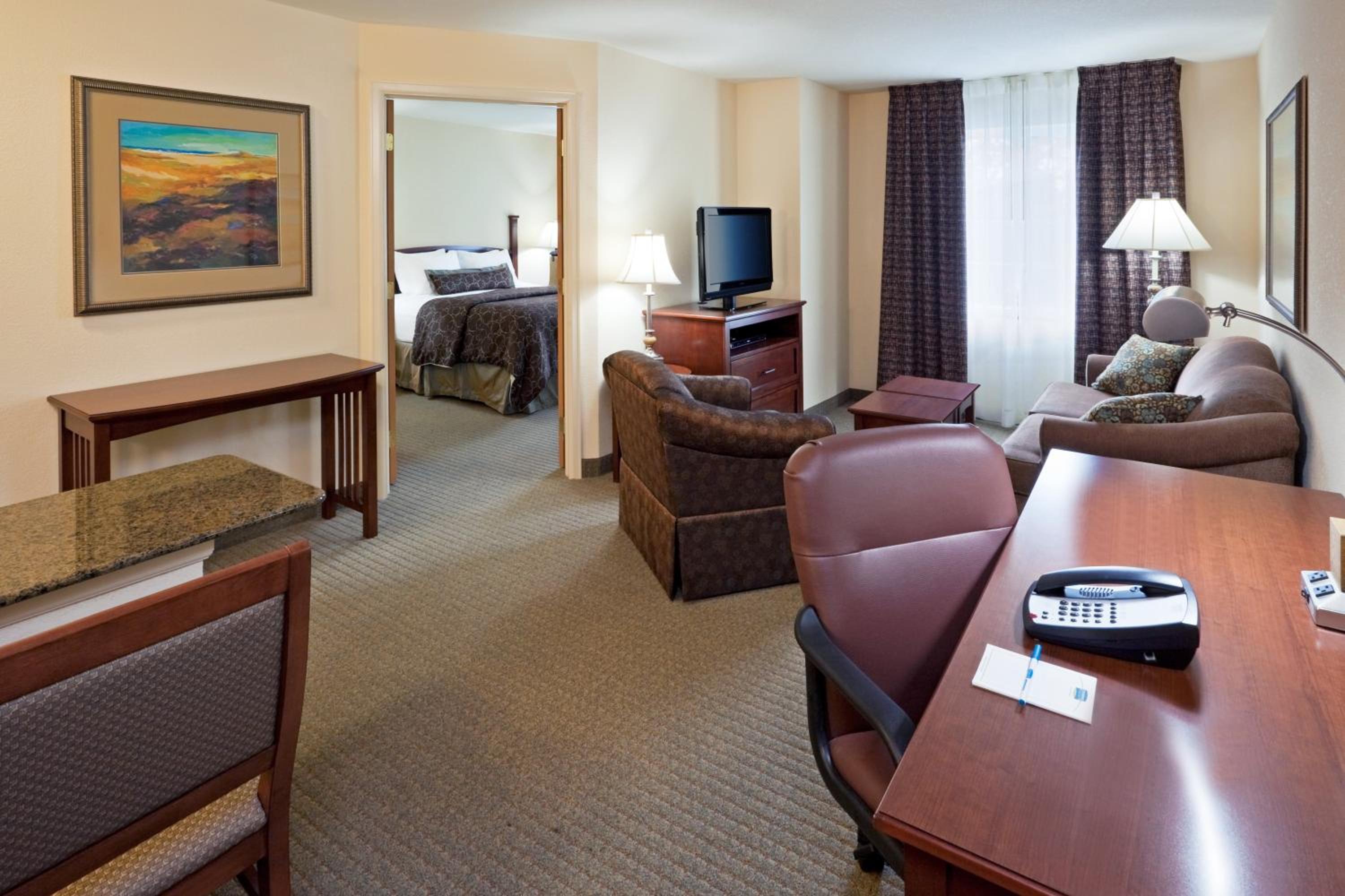 One-Bedroom Queen Suite -Non-Smoking - Photo 1