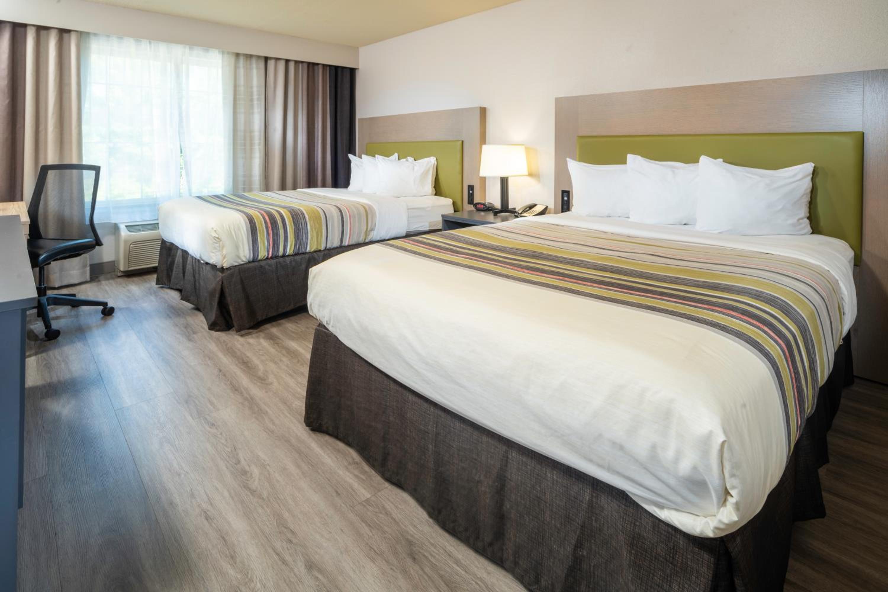 Queen Room with Two Queen Beds - Non-Smoking - Photo 1