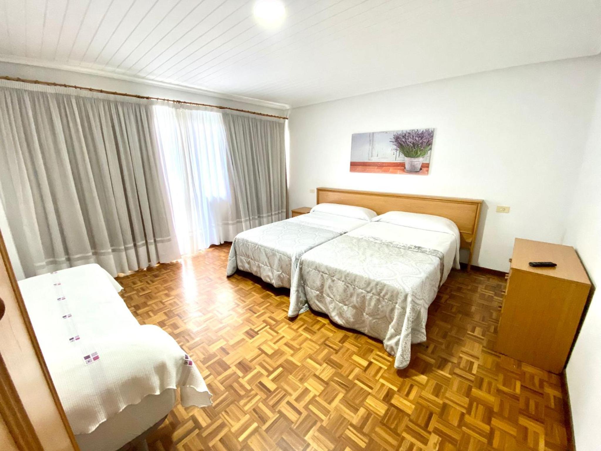 Habitación triple con terraza