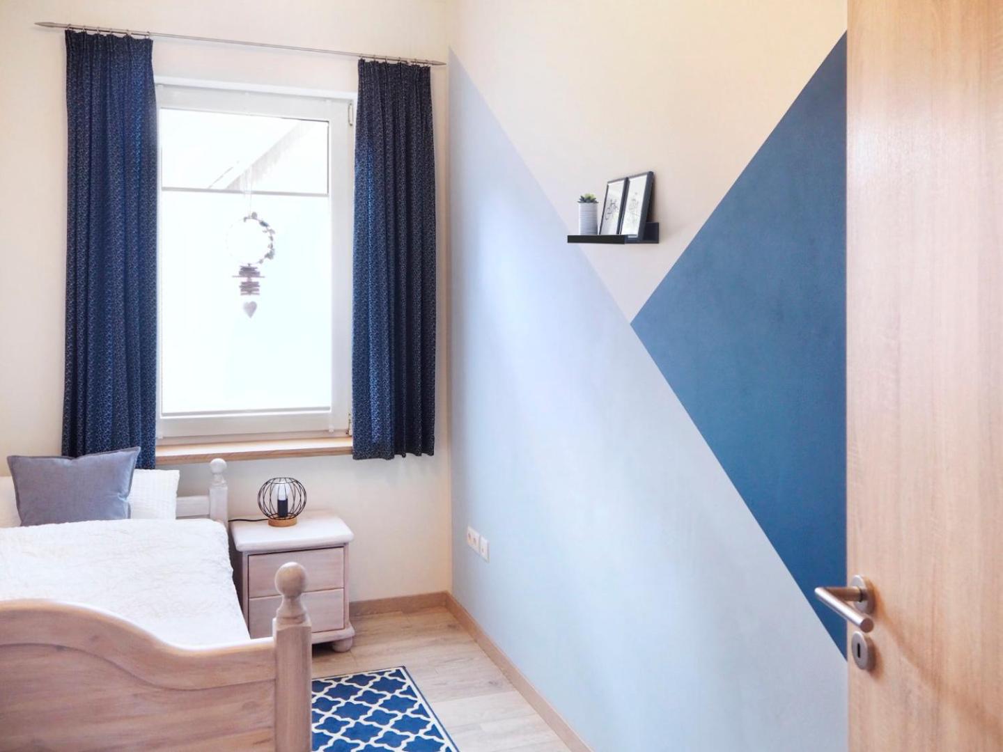 Three-Bedroom Apartment - Photo 35