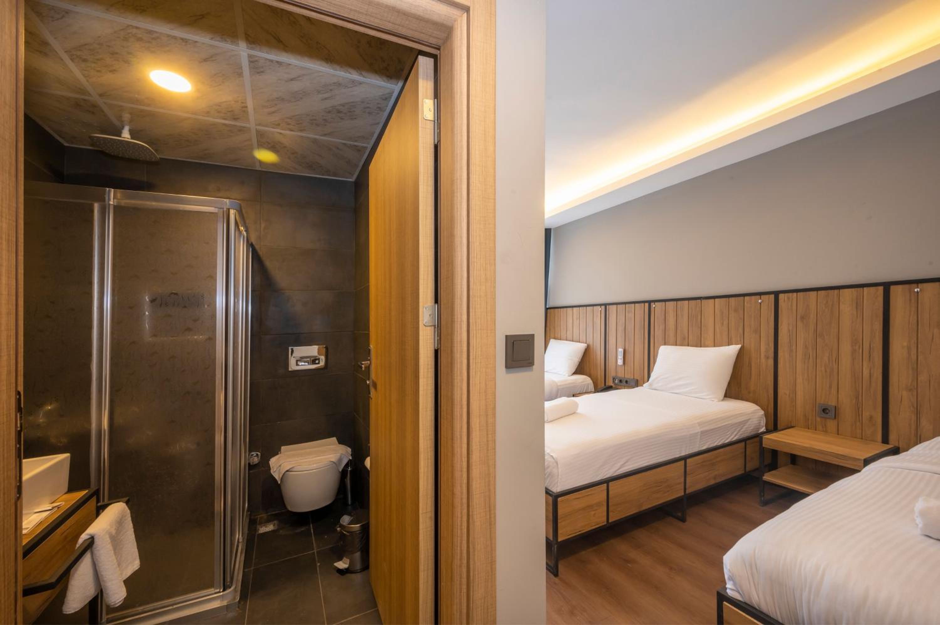 Deluxe Triple Room - Photo 7