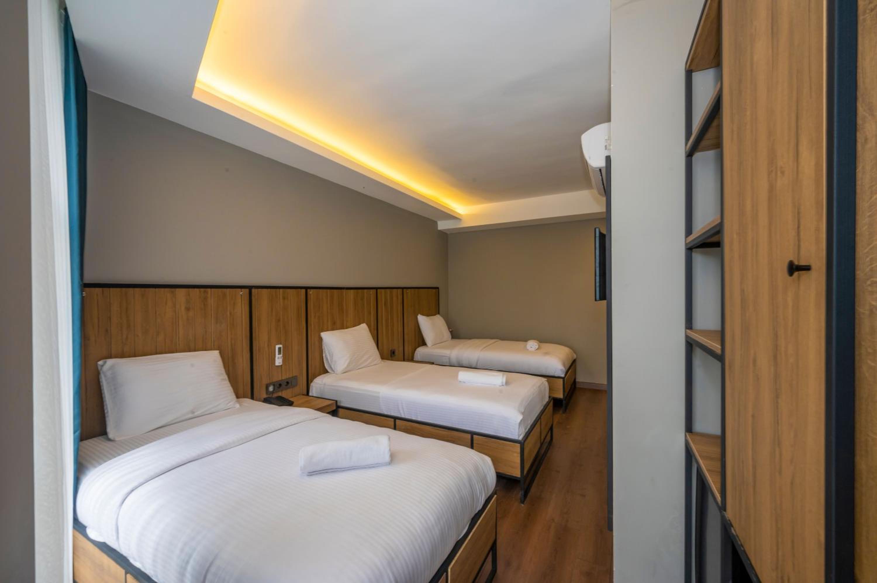 Deluxe Triple Room - Photo 1