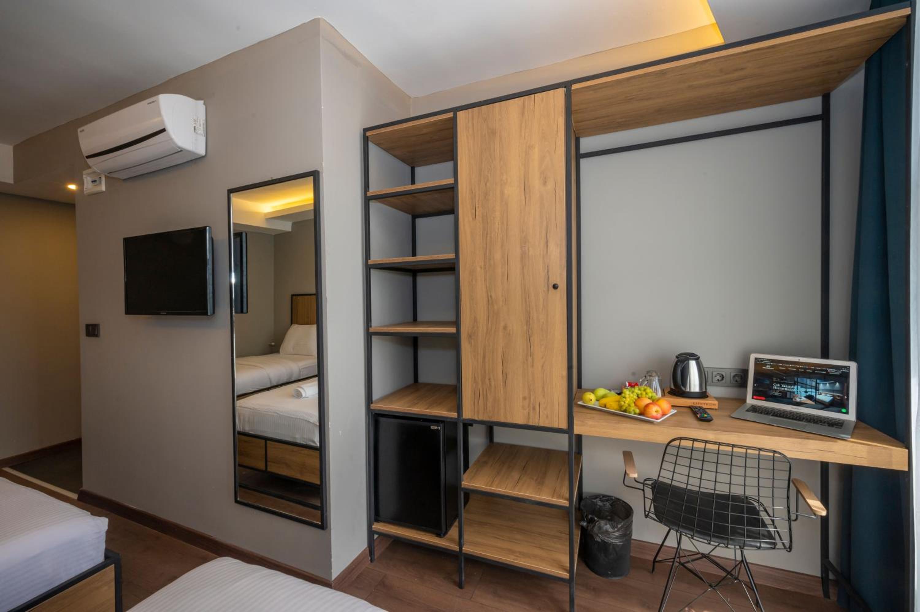 Deluxe Triple Room - Photo 12