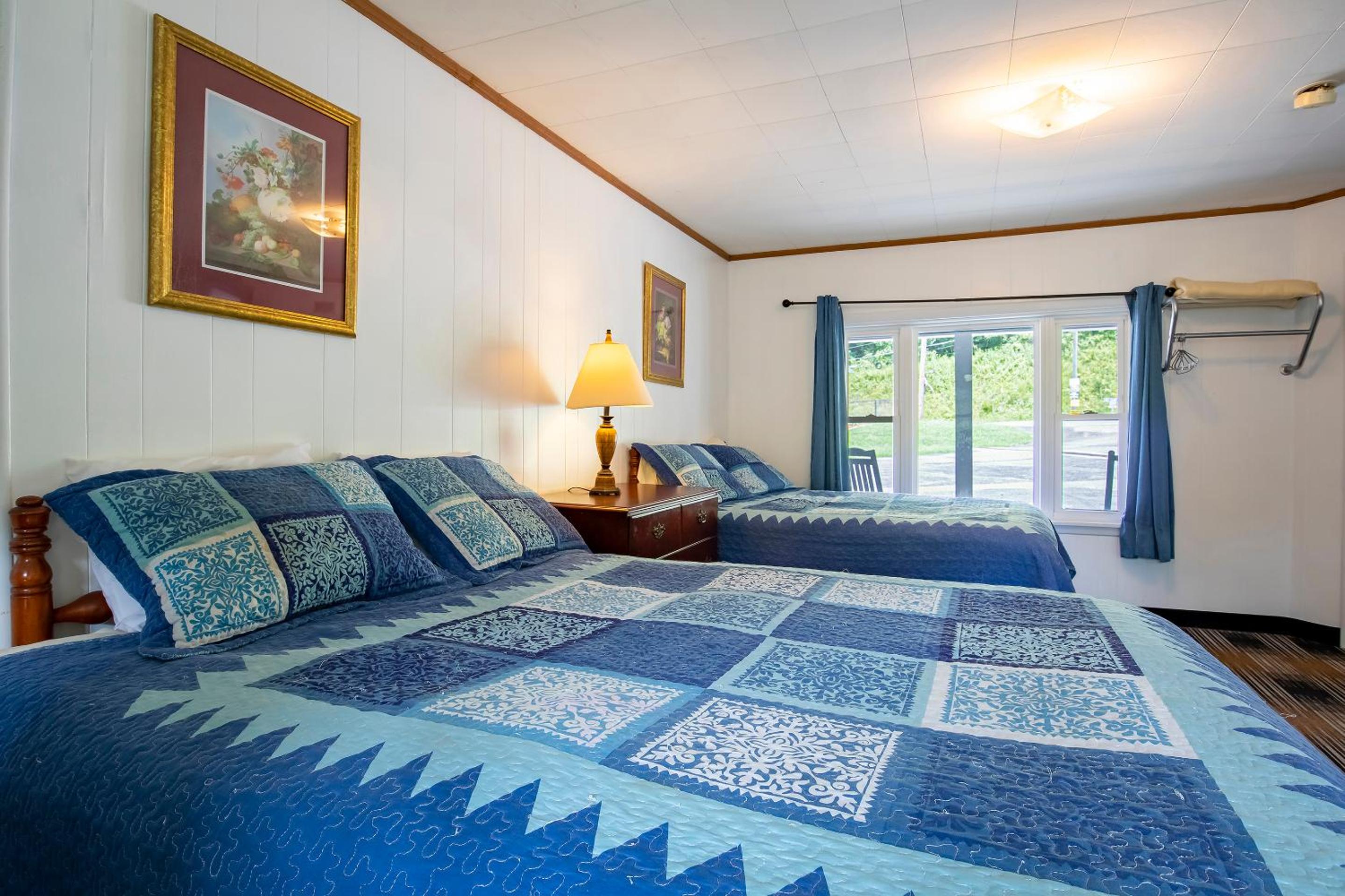 Queen Room with Two Queen Beds - Photo 1