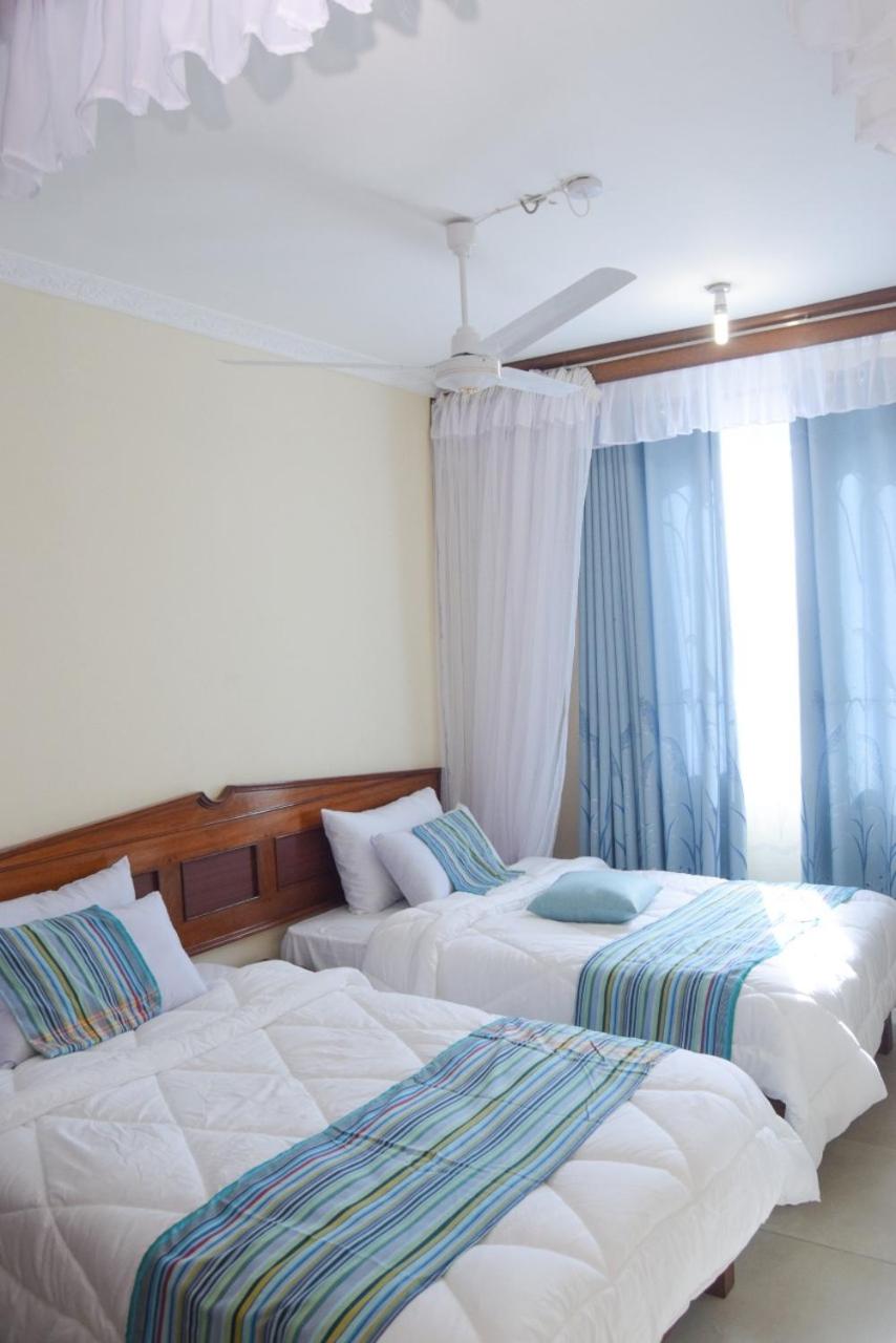 Three-Bedroom Apartment - Photo 20