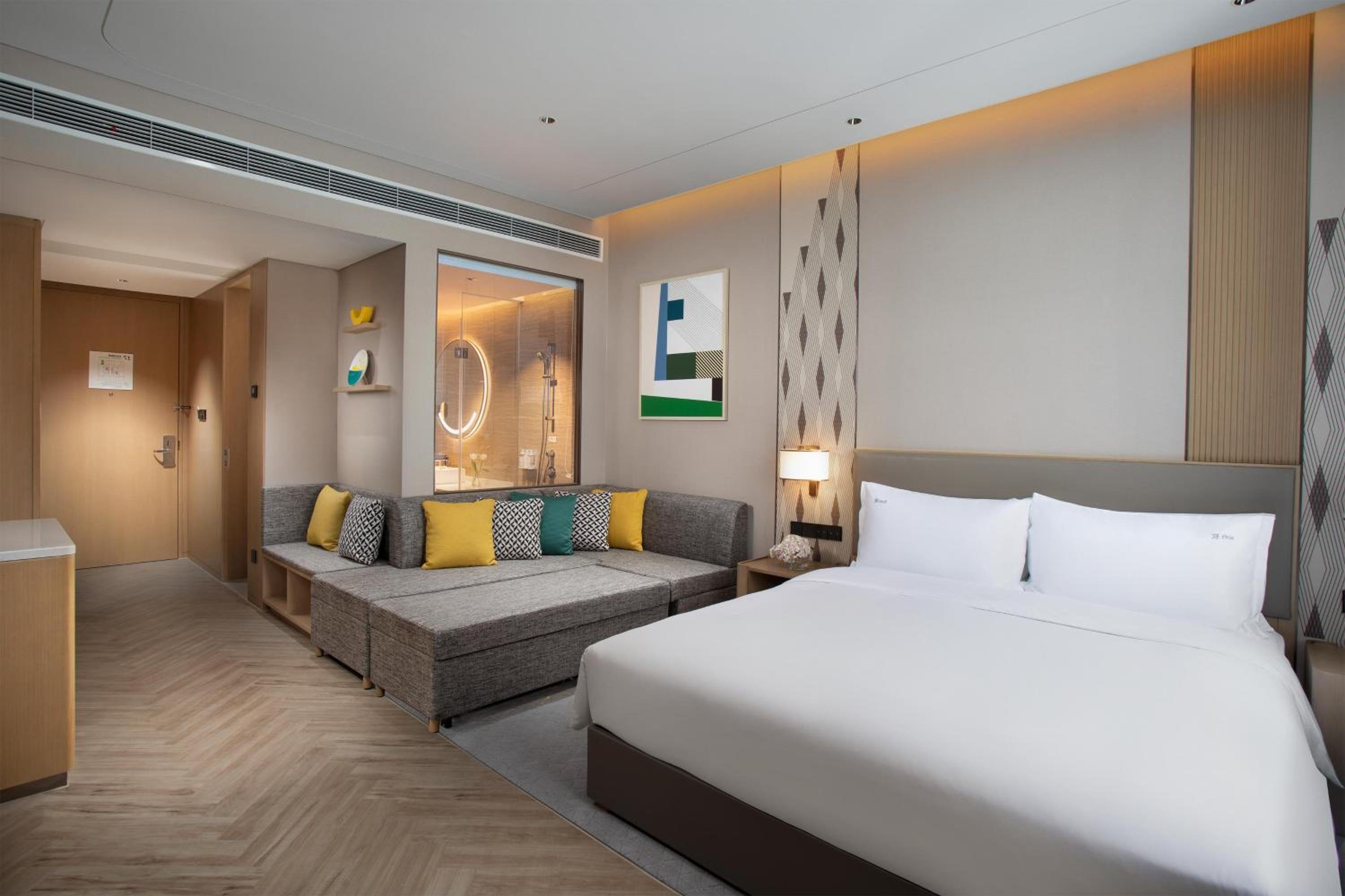 Premium King Room with Sofa Bed - Photo 1