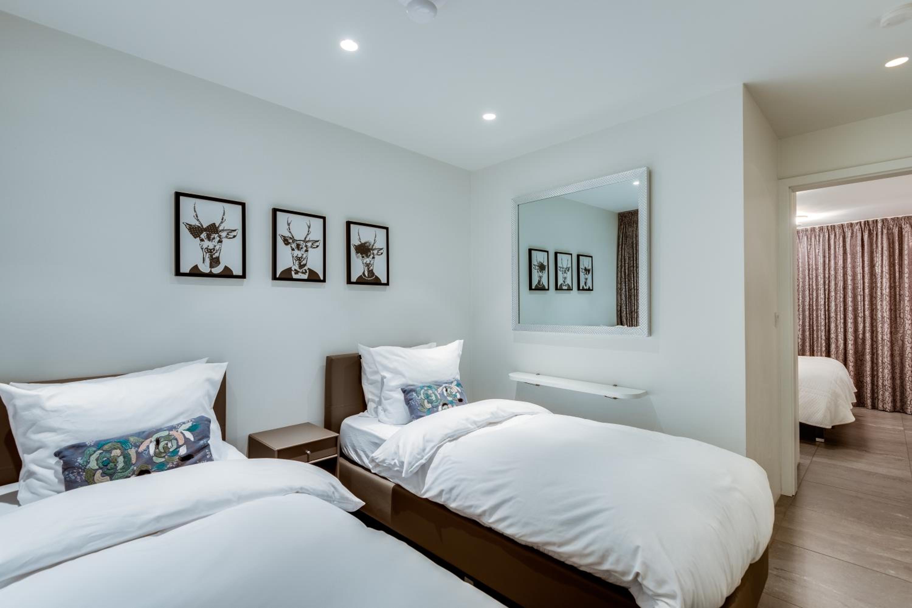 Deluxe Two-Bedroom Suite with Balcony - Photo 3